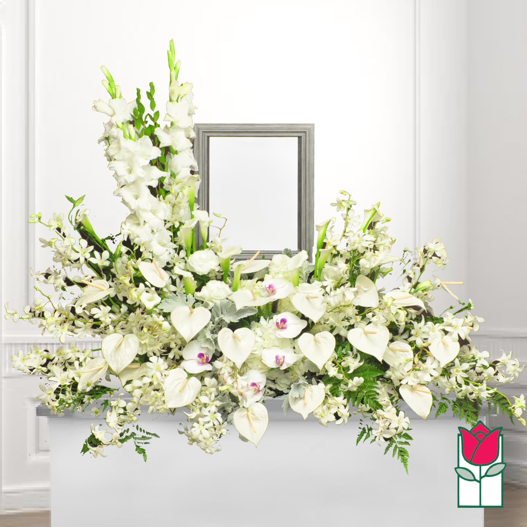 White floral casket spray with orchids and gladiolus