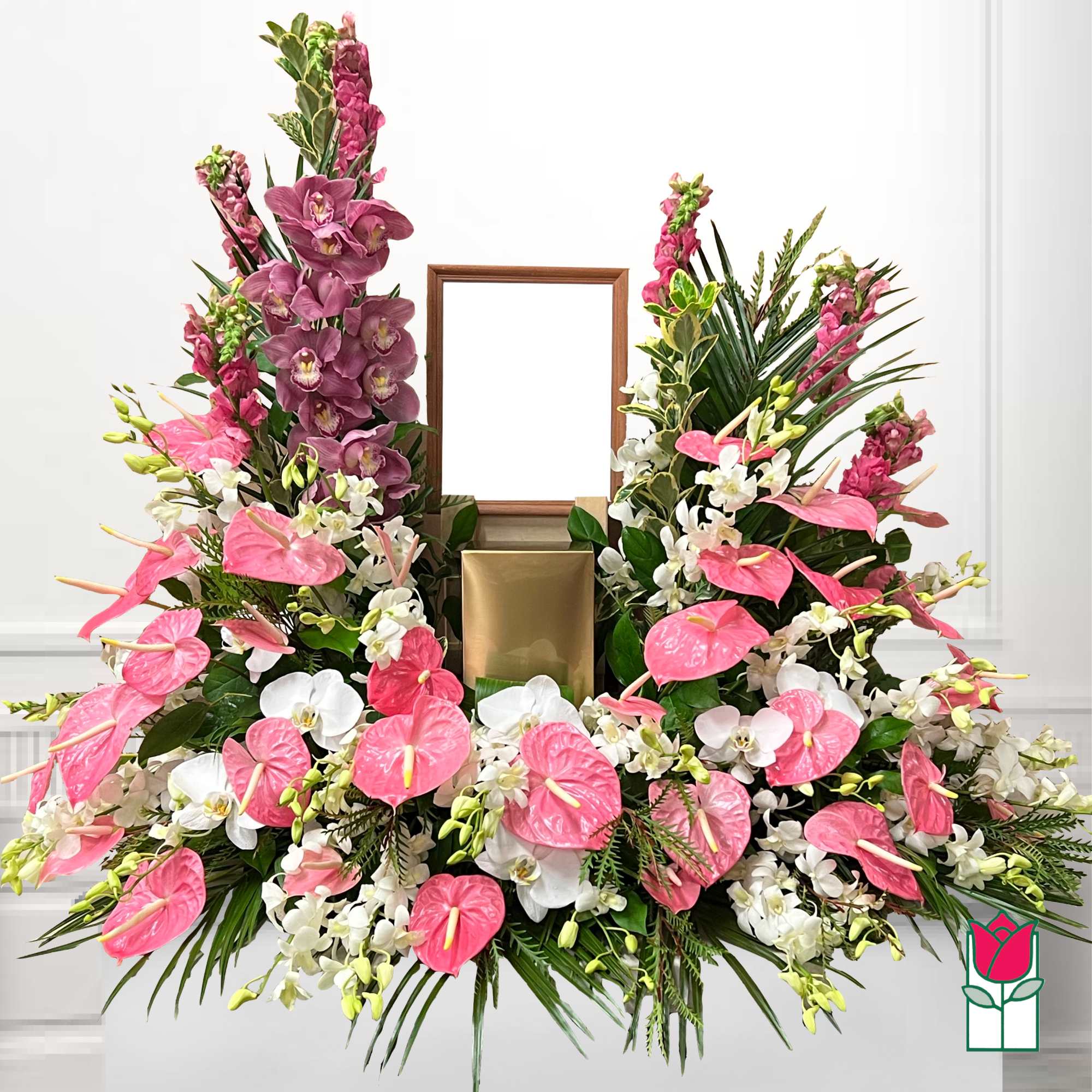 Pink and white floral wreath with a central frame and gold box