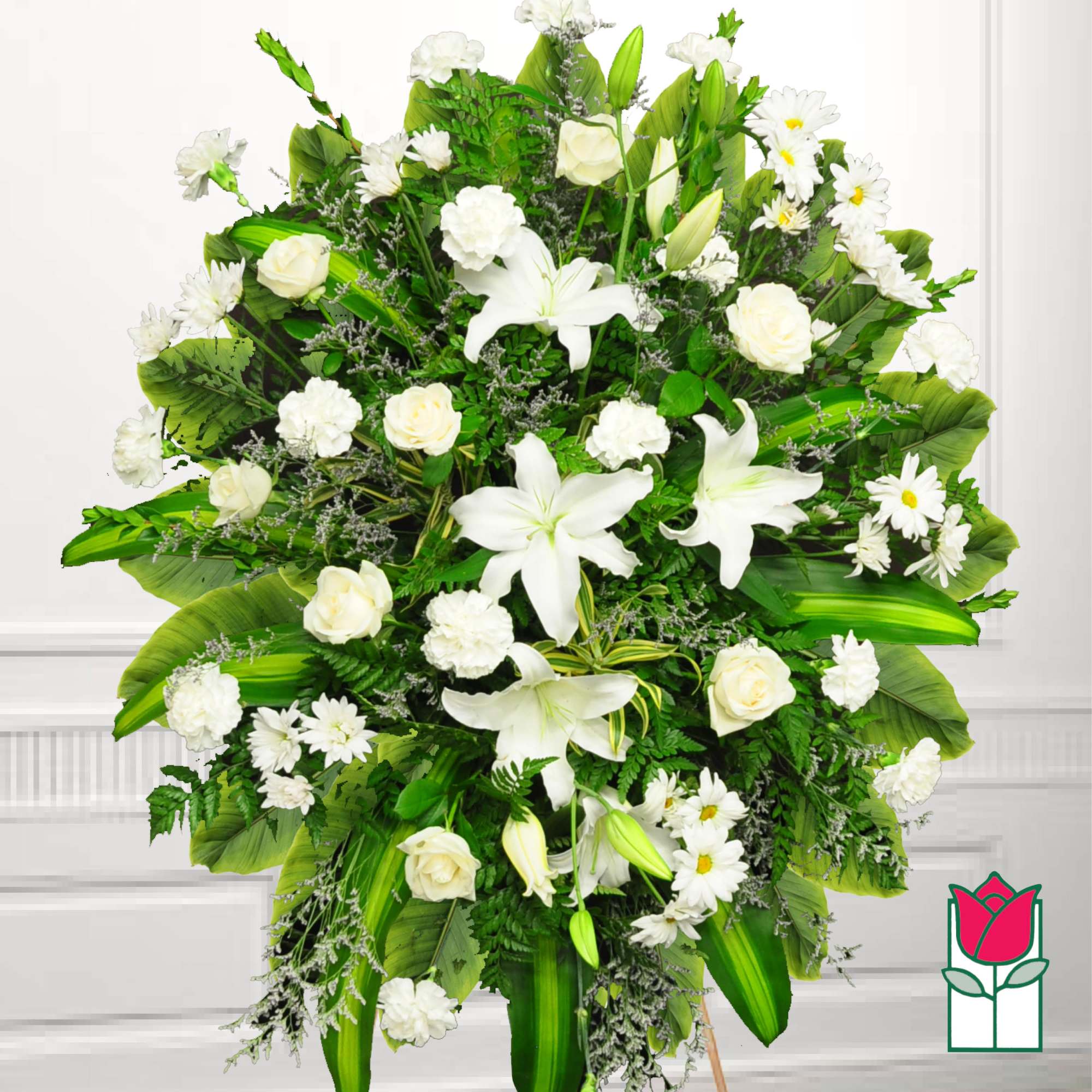 Large white floral spray with lilies, roses, and daisies