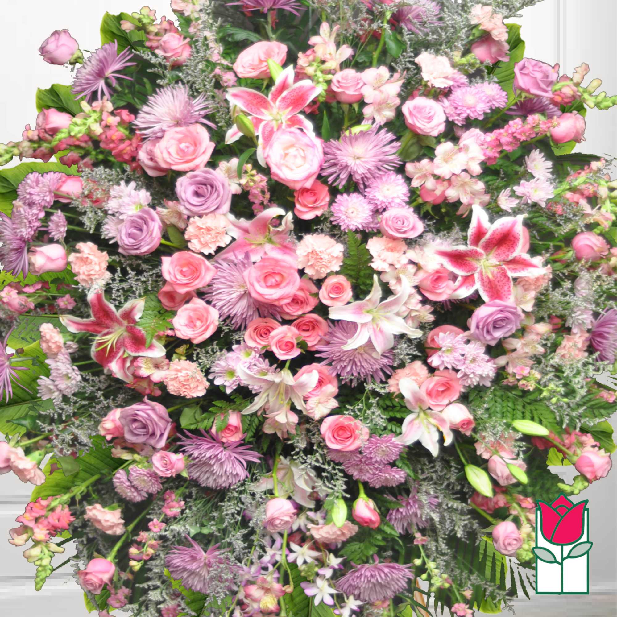 Large pink and lavender floral spray with roses and lilies