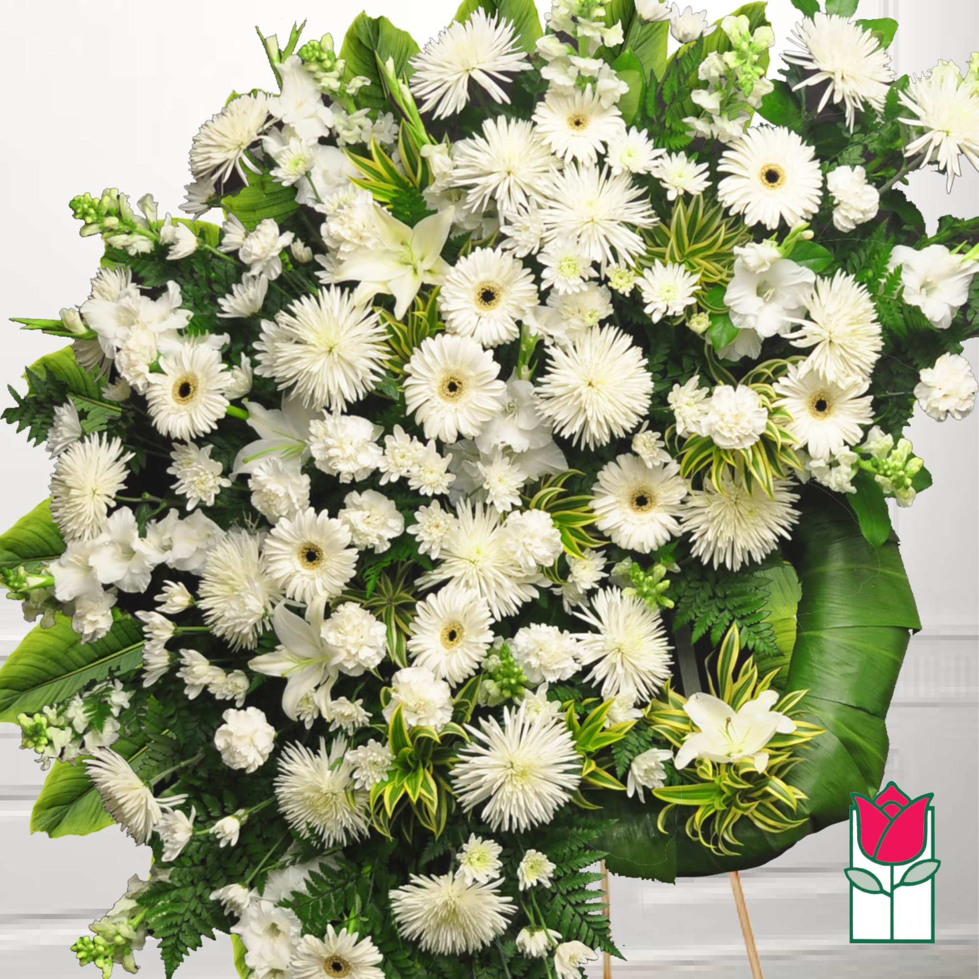 Large white funeral spray with gerbera daisies and lilies
