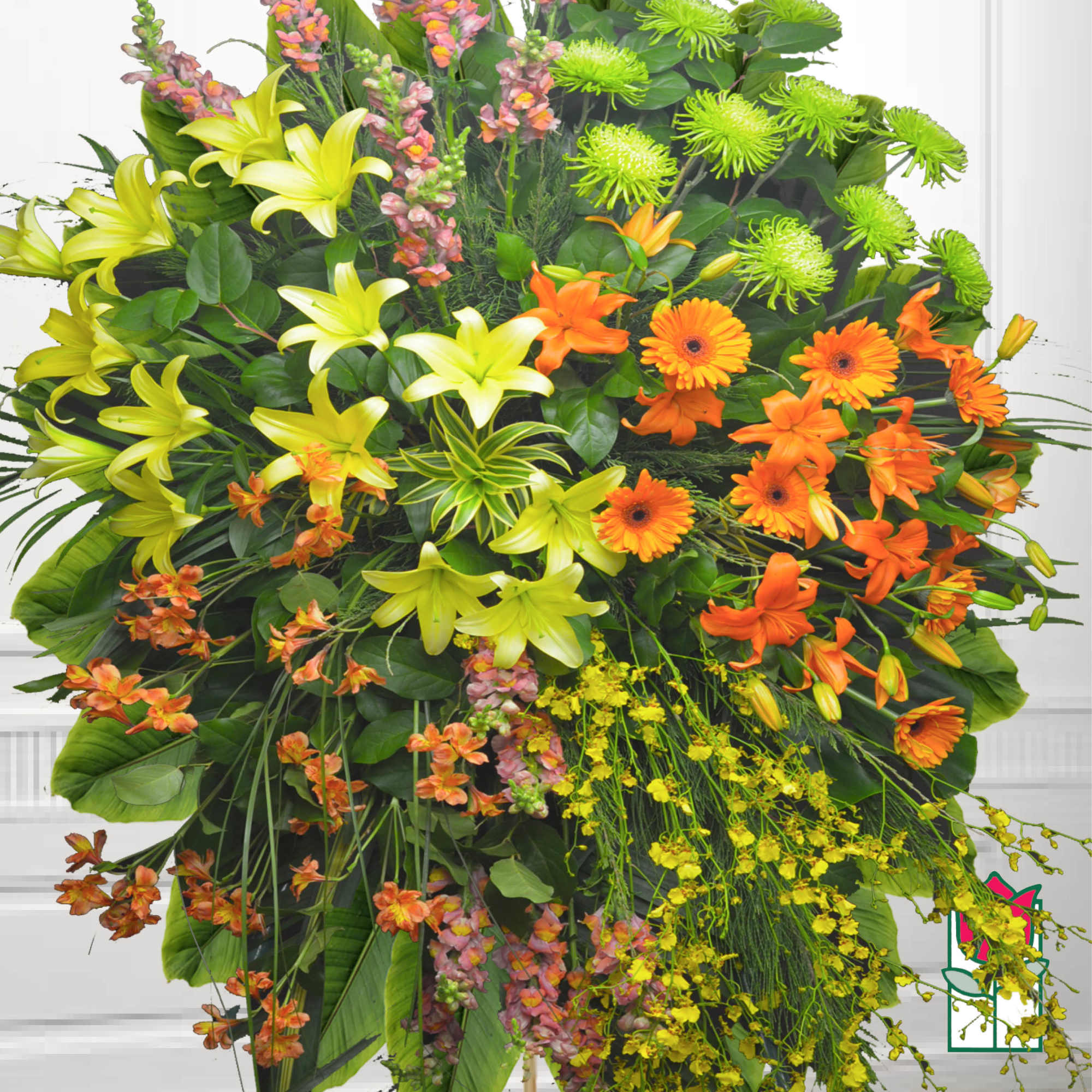 Large standing floral spray with orange and yellow blooms, photo 2 of 2