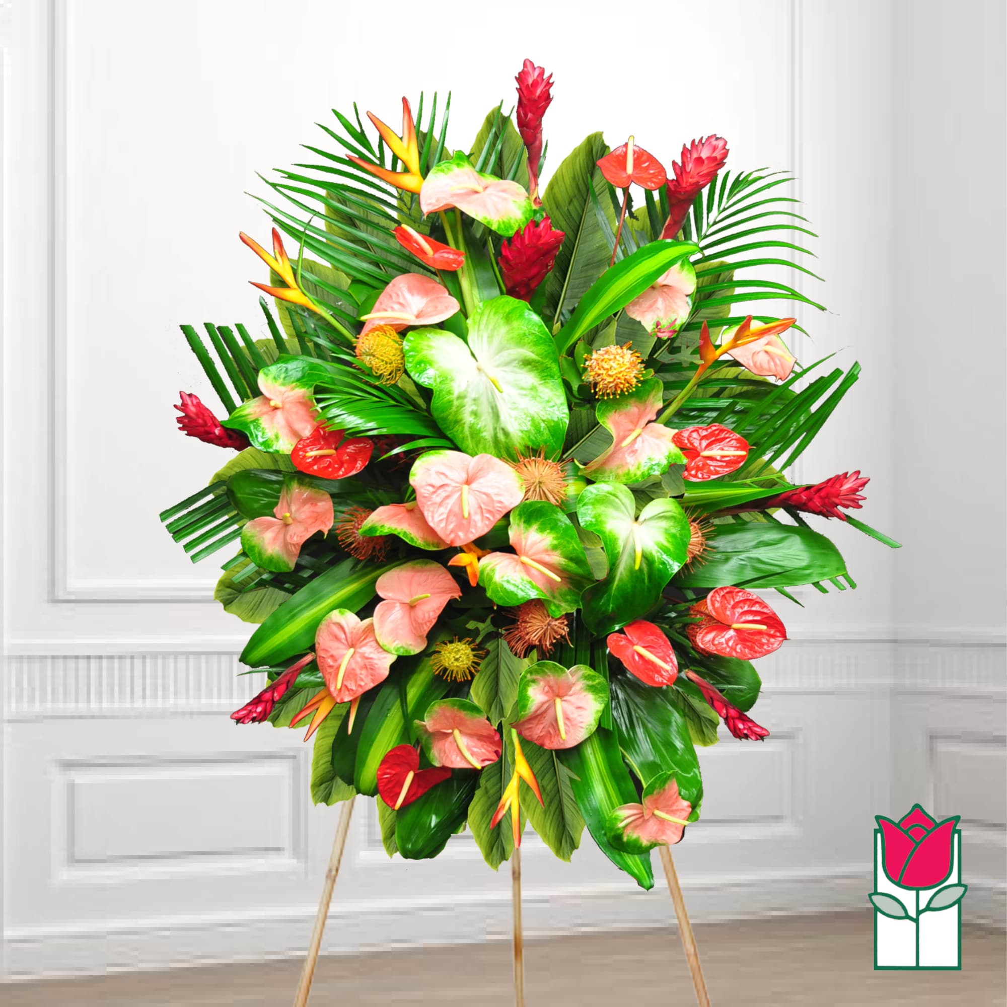 Tropical standing arrangement with pink anthuriums and red ginger flowers