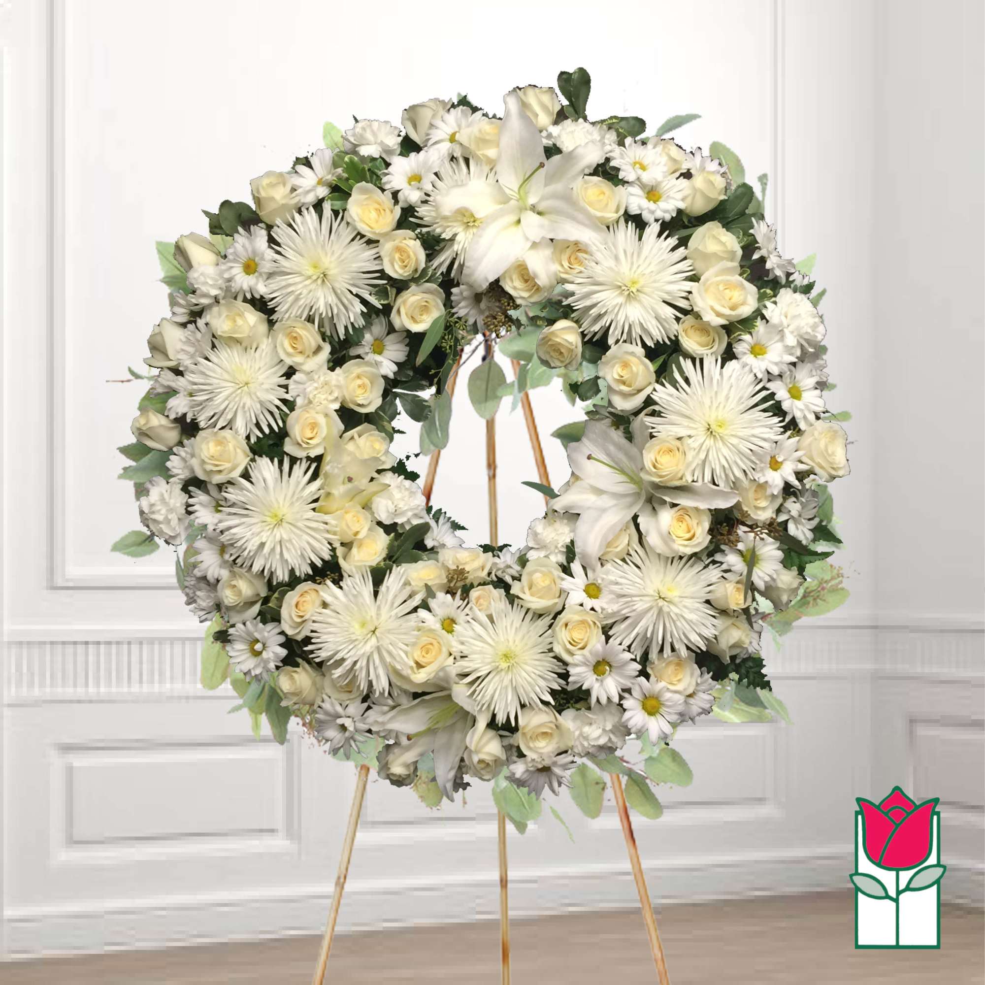 White floral wreath on a standing easel
