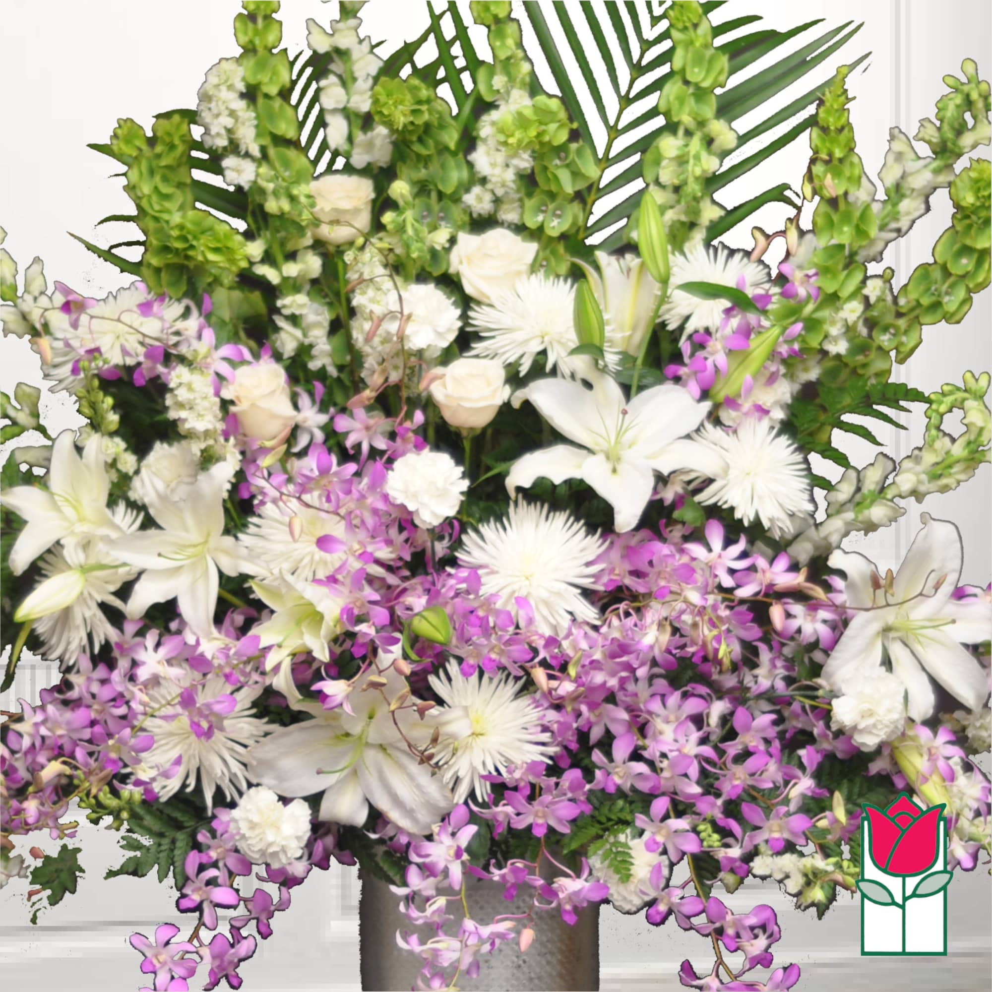 Large white and purple floral arrangement in a vase