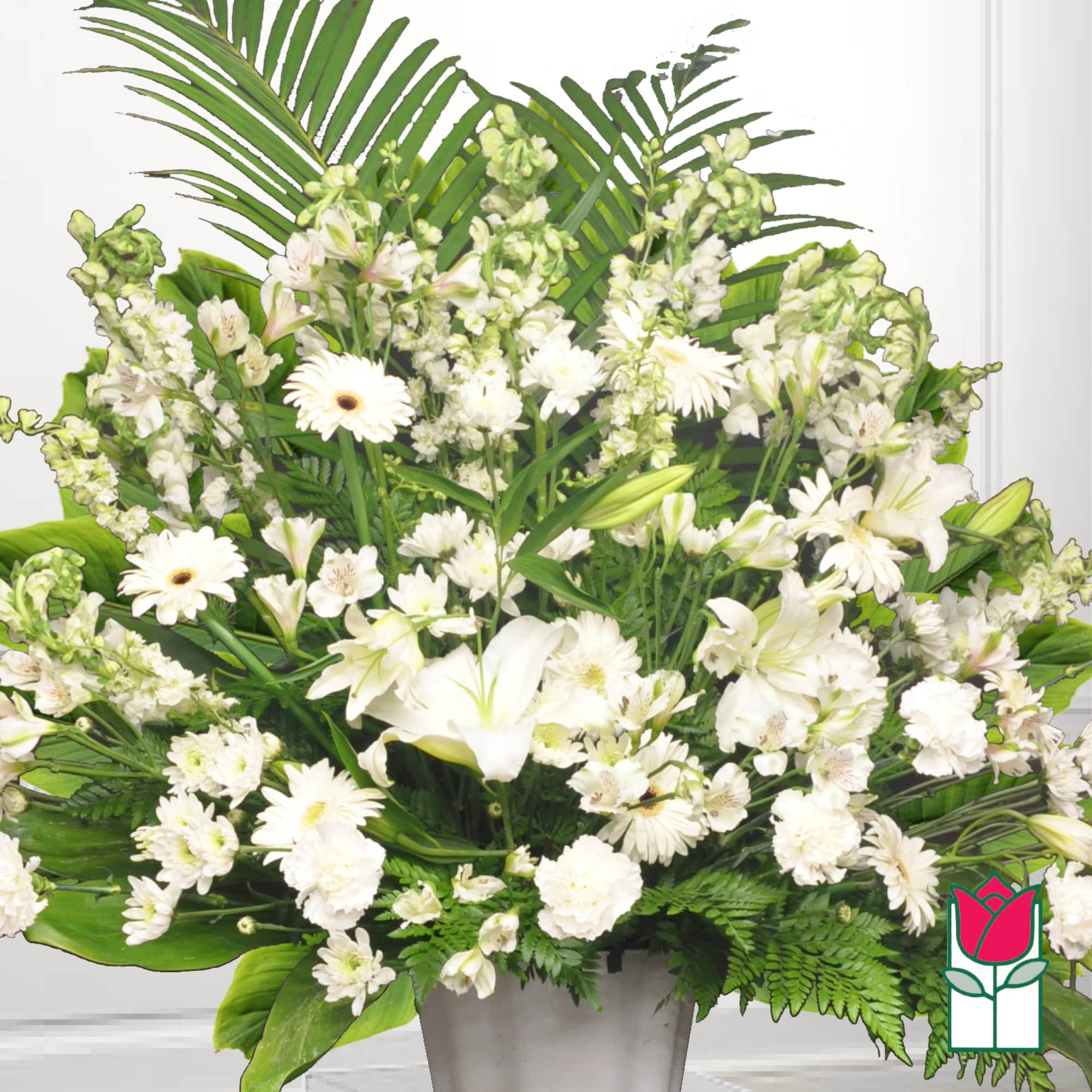Large white floral arrangement in a gray vase