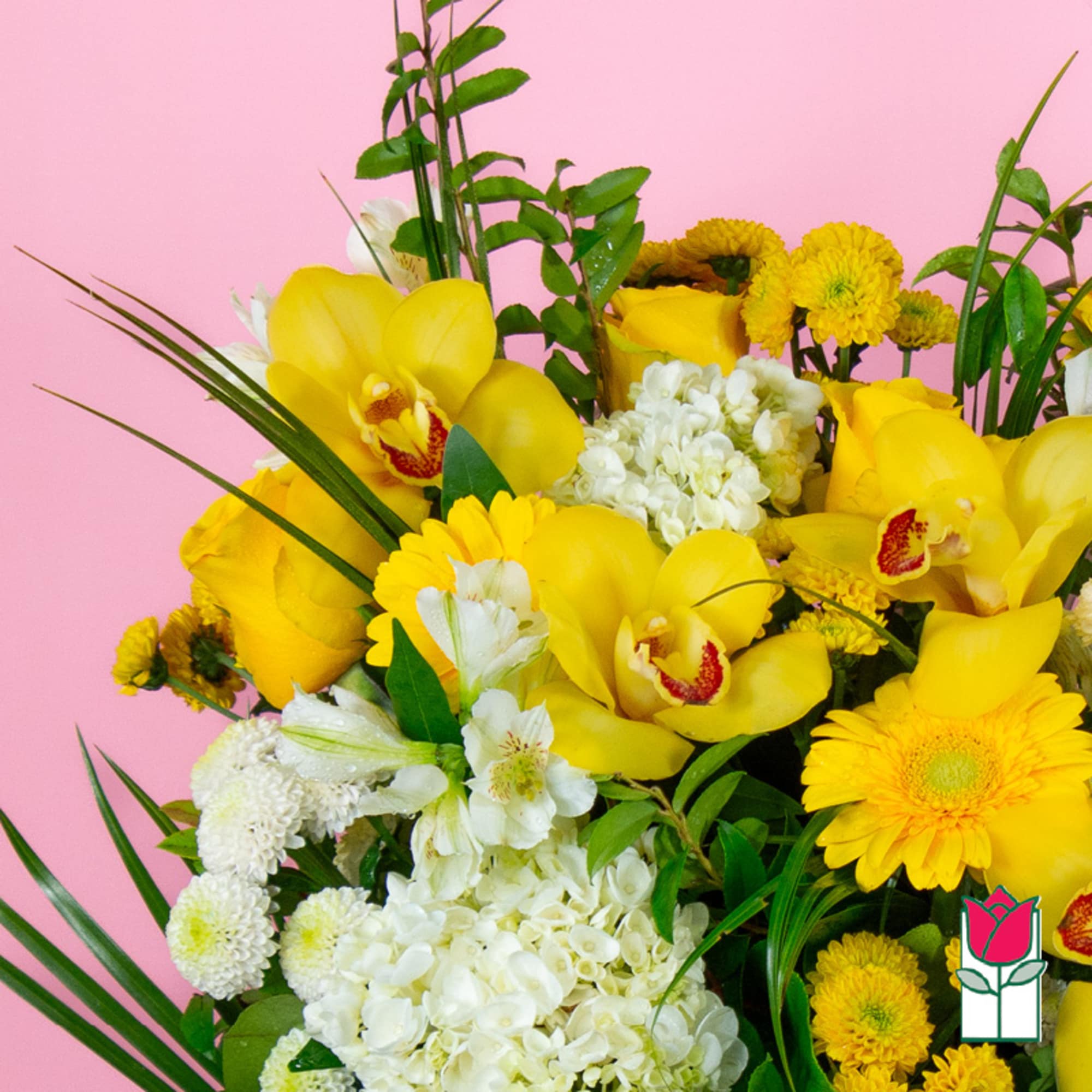 Yellow orchids and white flowers in a mixed bouquet