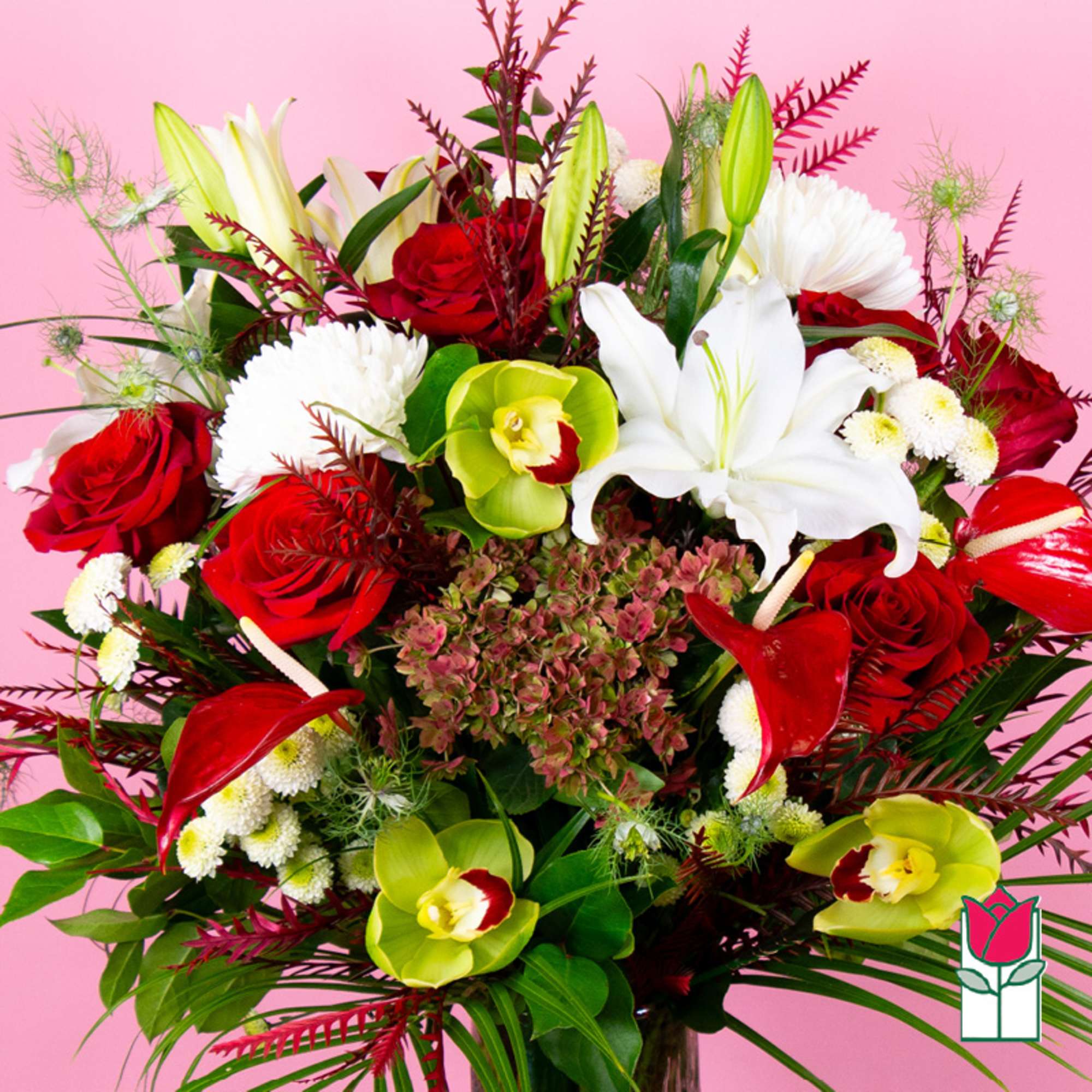 Bouquet of red roses, white lilies, and green orchids on a pink background, photo 2 of 4
