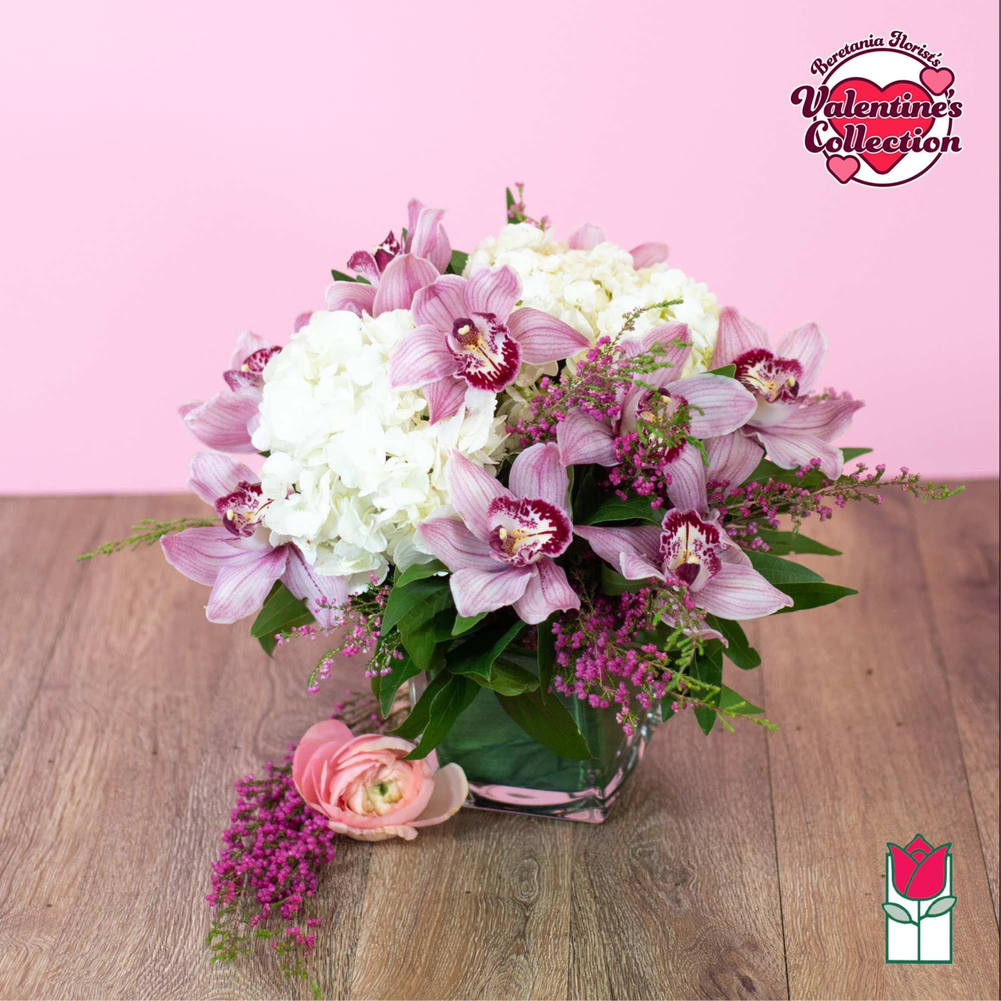 Pink orchids and white hydrangeas arranged in a glass vase, photo 6 of 6