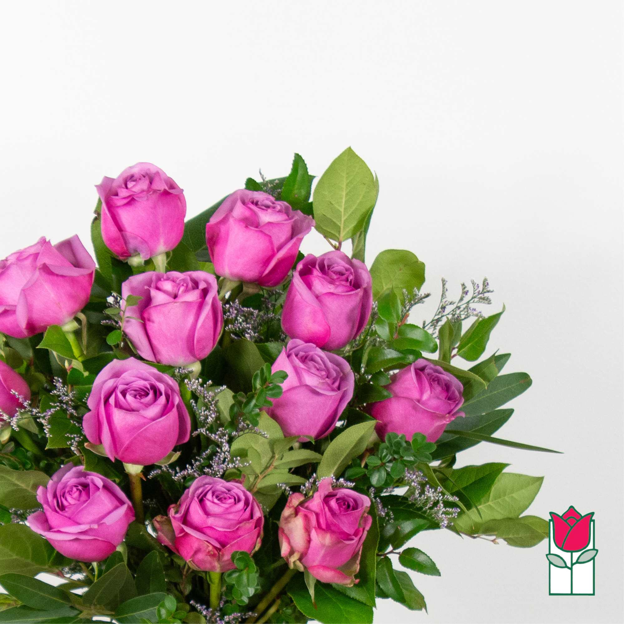 Bouquet of pink roses with mixed greenery