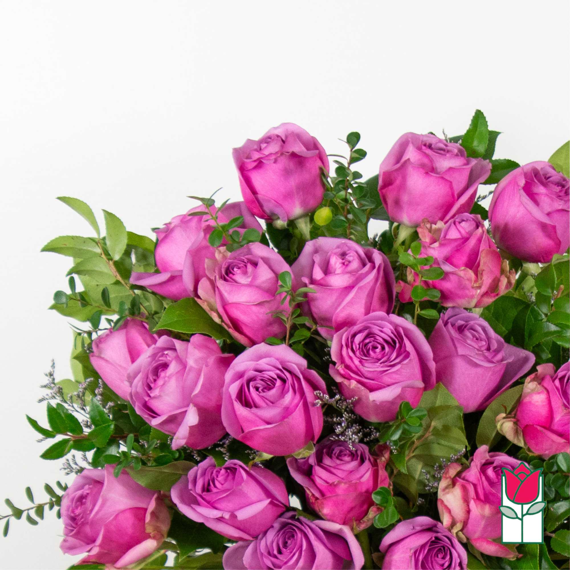 Bouquet of pink roses with mixed greenery