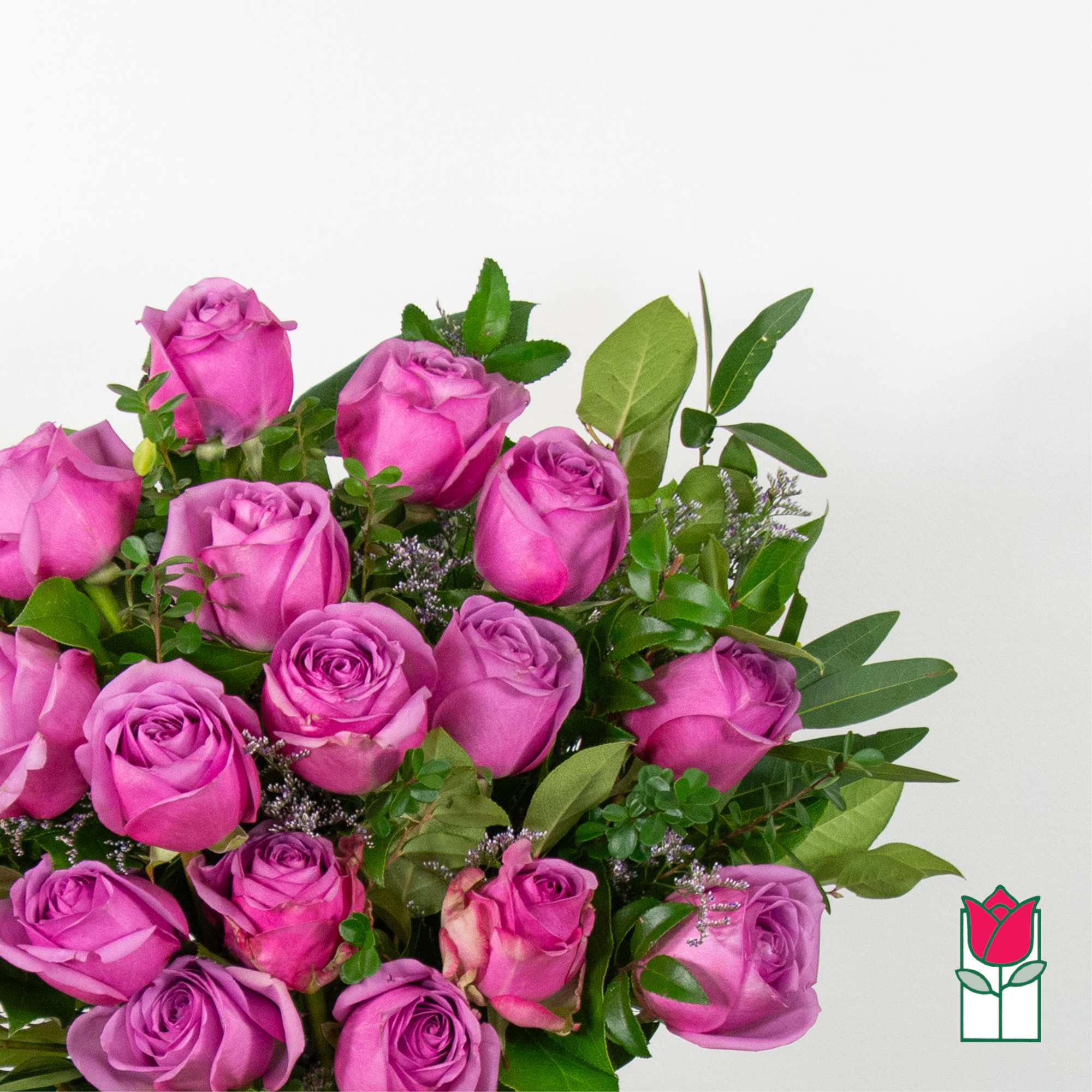 Bouquet of pink and purple roses with greenery