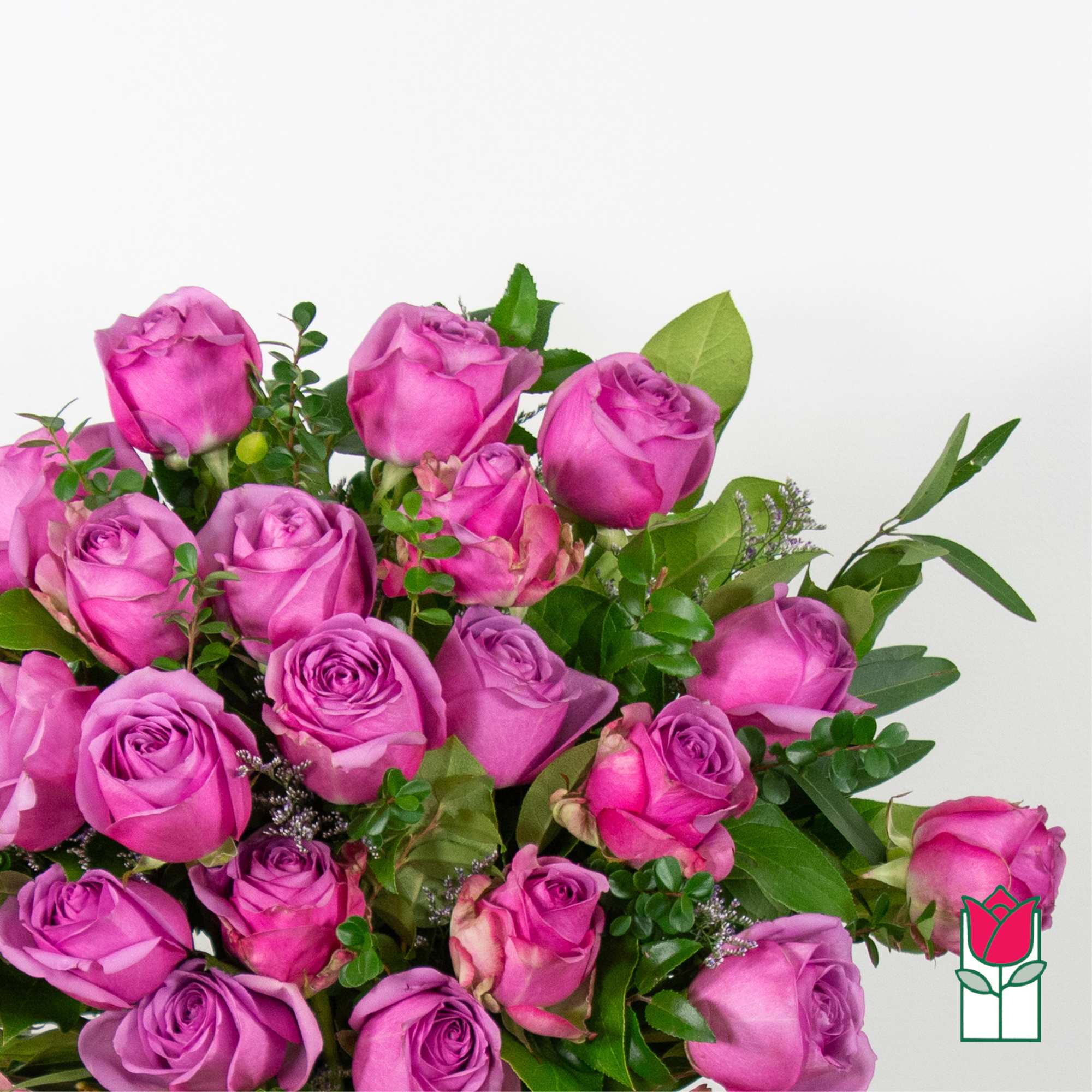 Bouquet of pink and purple roses with greenery