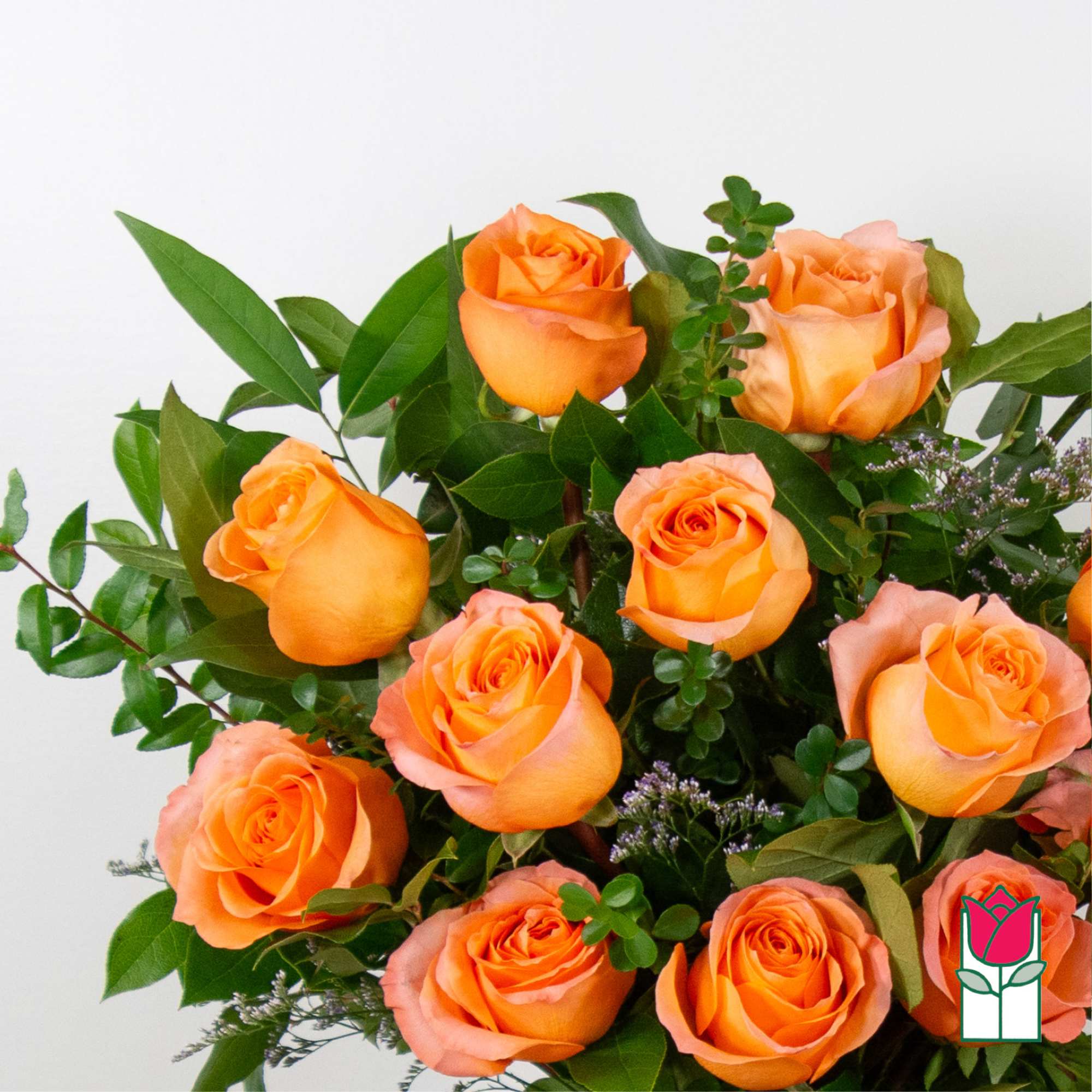 Bouquet of orange roses with green foliage