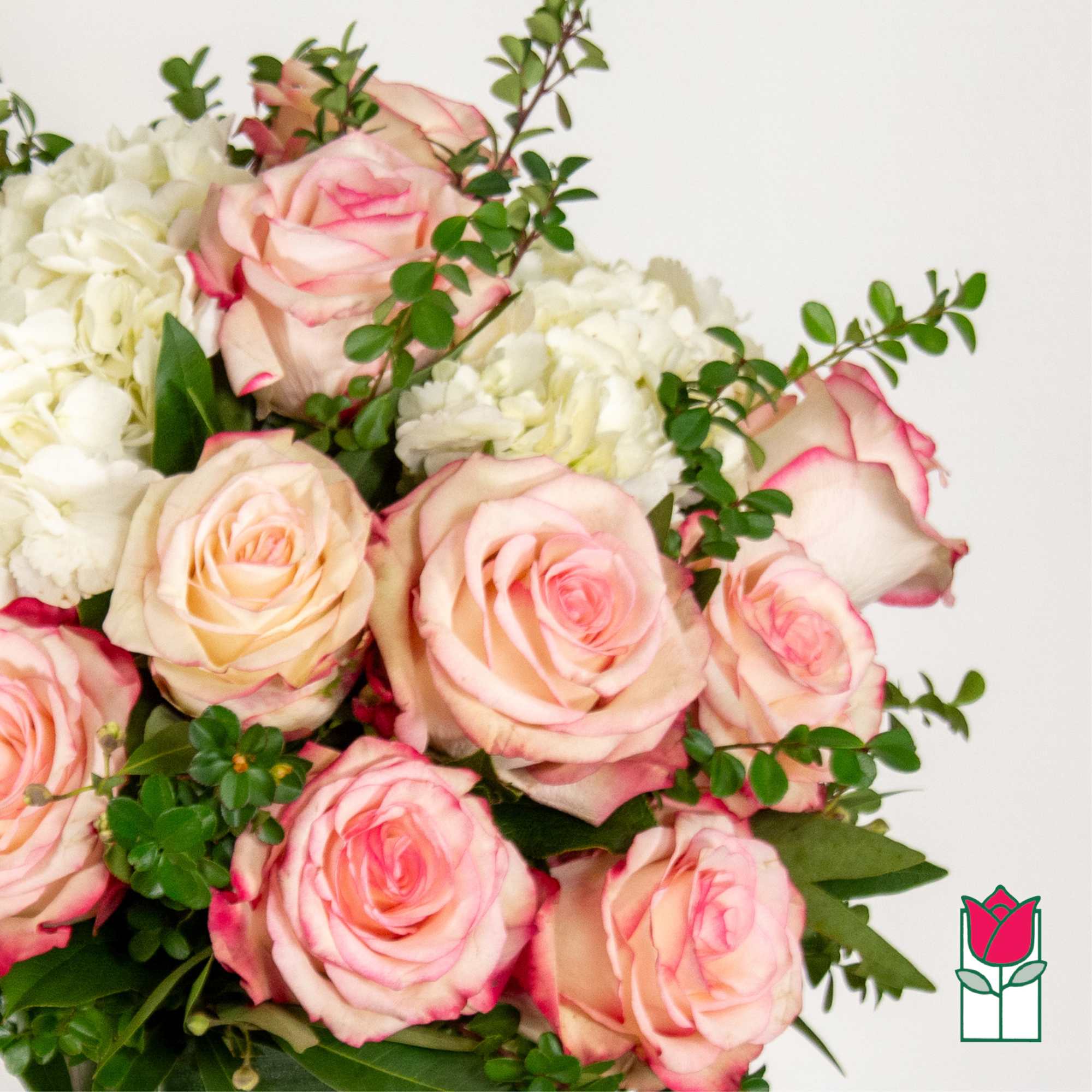 Bouquet of pink-edged roses and white flowers