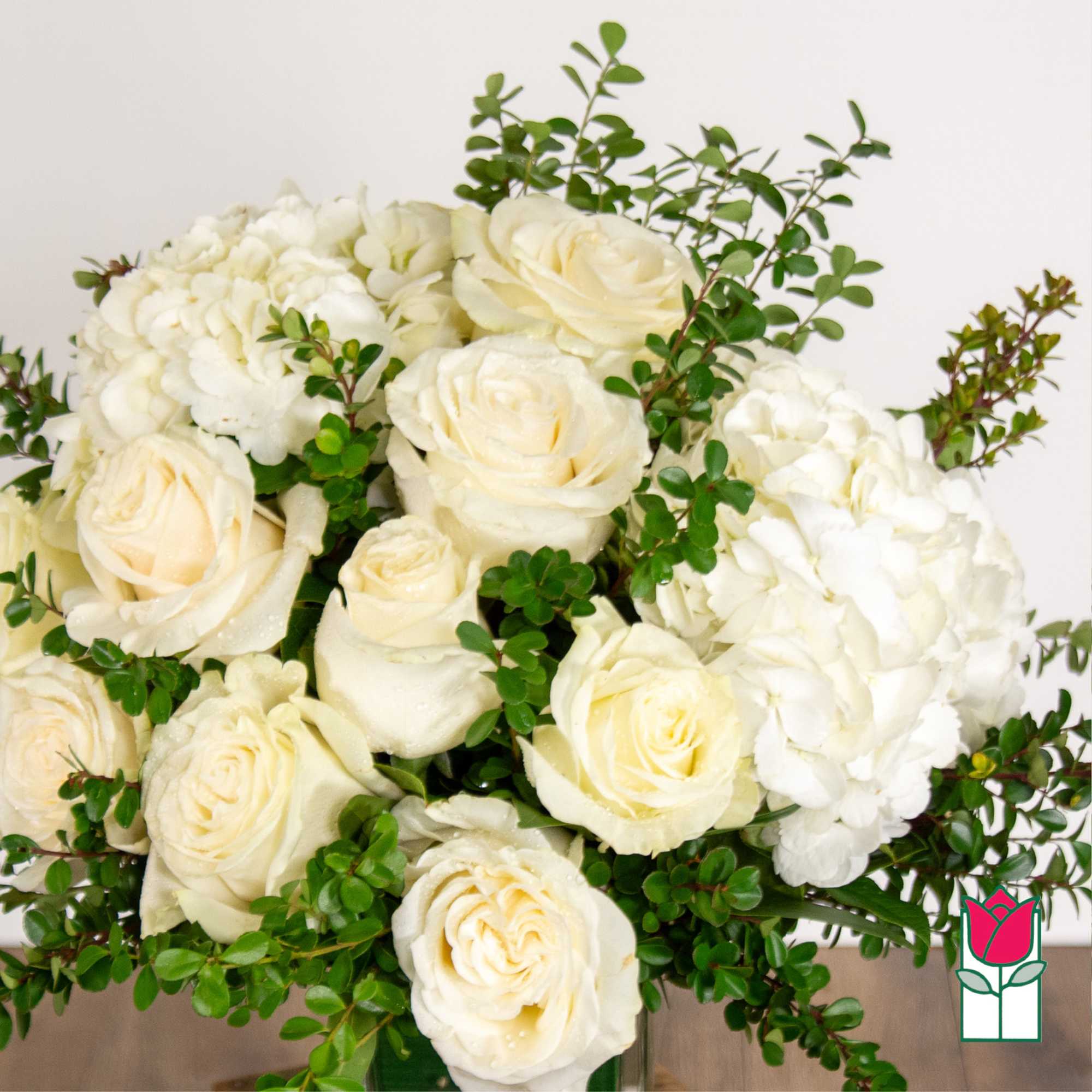 Bouquet of white roses and hydrangeas with green foliage, photo 2 of 4