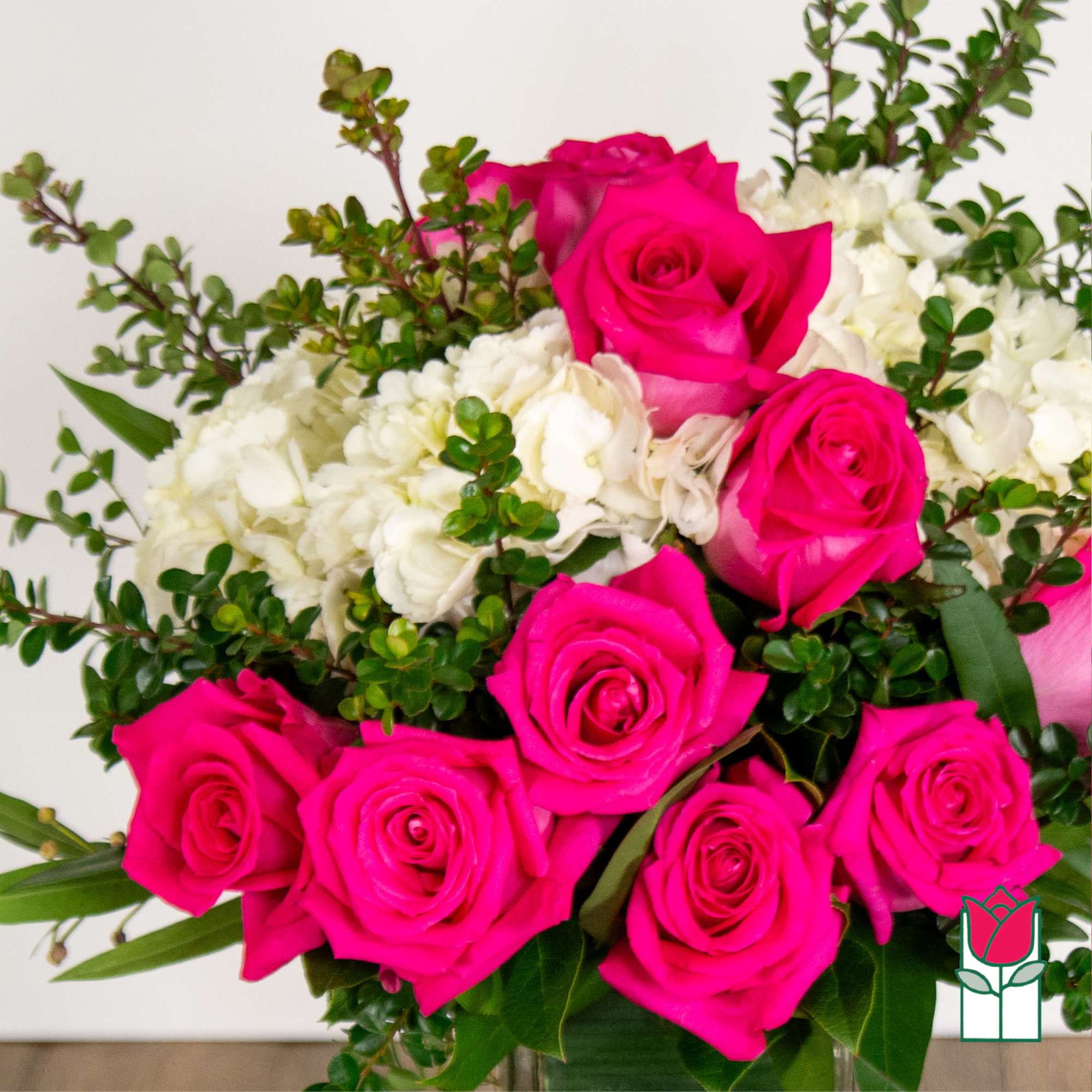 Bouquet of hot pink roses and white flowers with greenery, photo 3 of 5