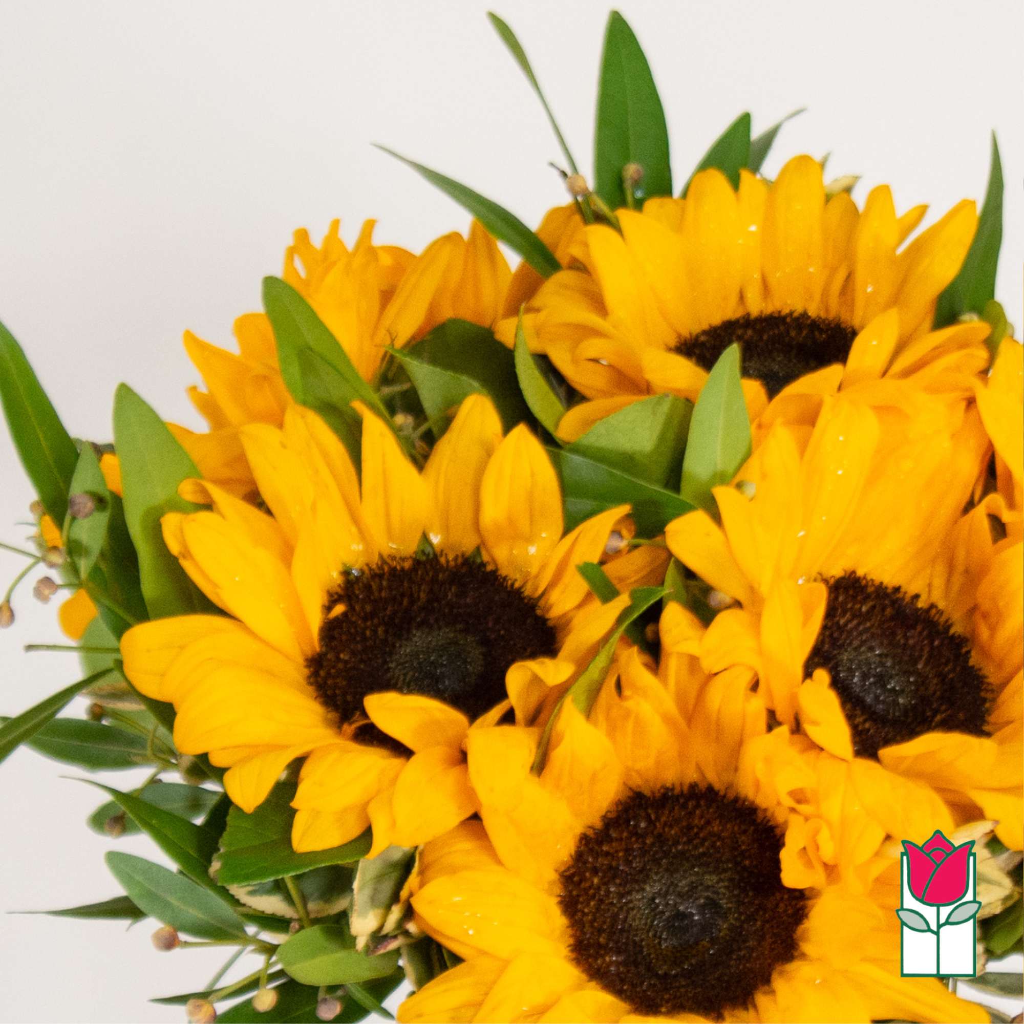 Bouquet of yellow sunflowers with green foliage, photo 3 of 4
