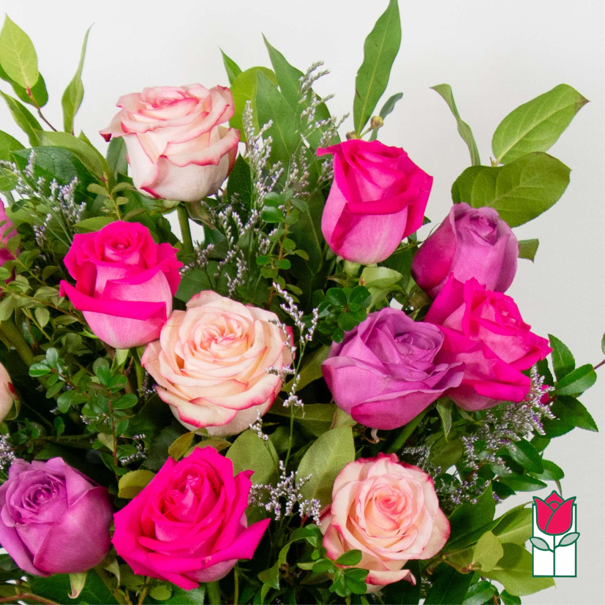 Bouquet of pink, purple, and cream roses with greenery, photo 8 of 8
