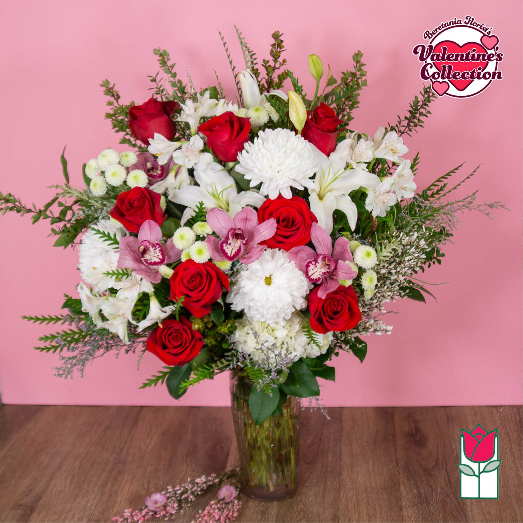 Bouquet of red roses, white lilies, and pink orchids in a glass vase, photo 5 of 5