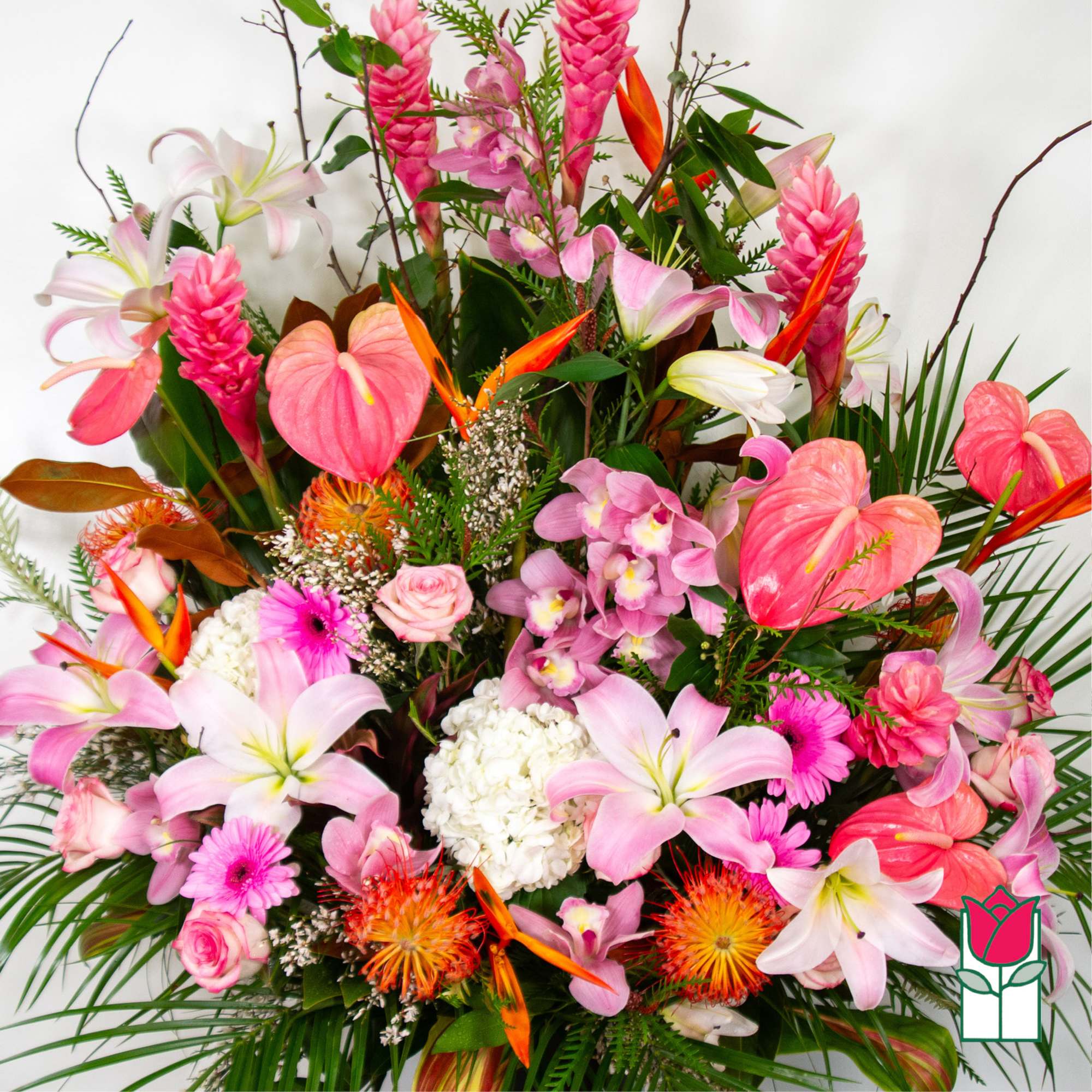 Tropical bouquet with pink lilies, orchids, anthuriums, and orange bird-of-paradise