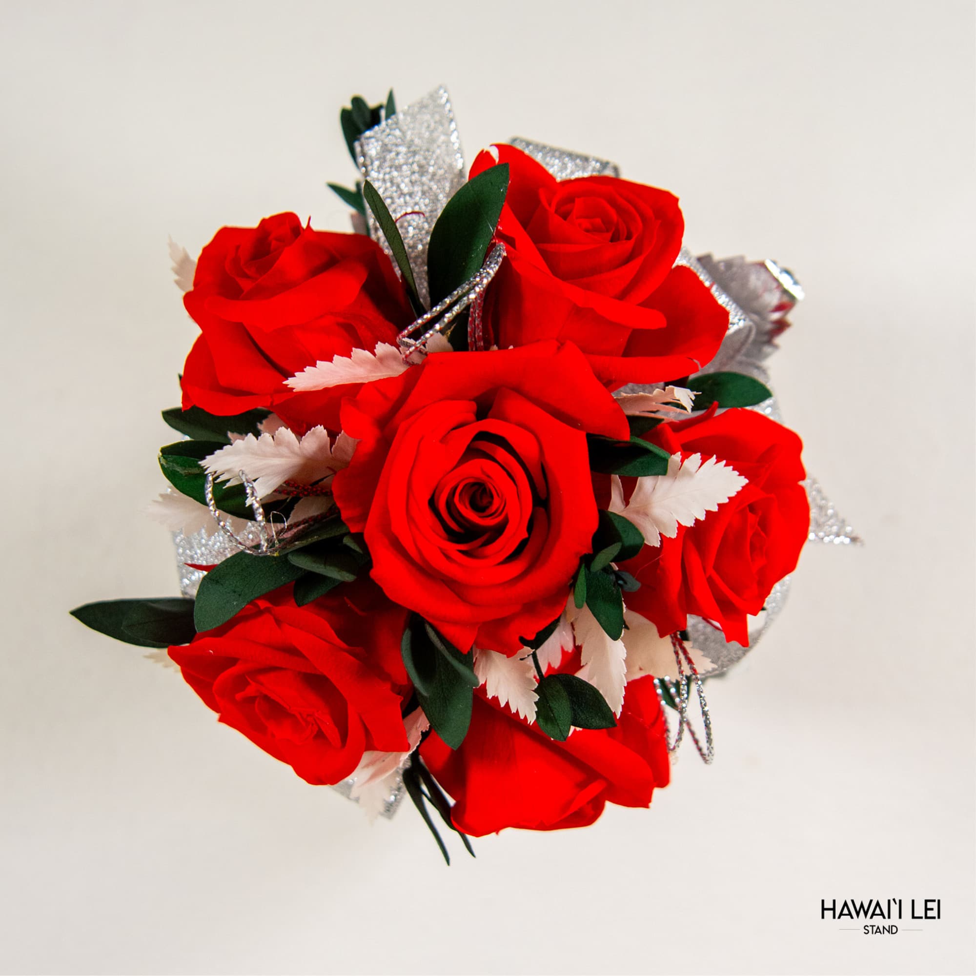 Bouquet of red roses with silver ribbon accents