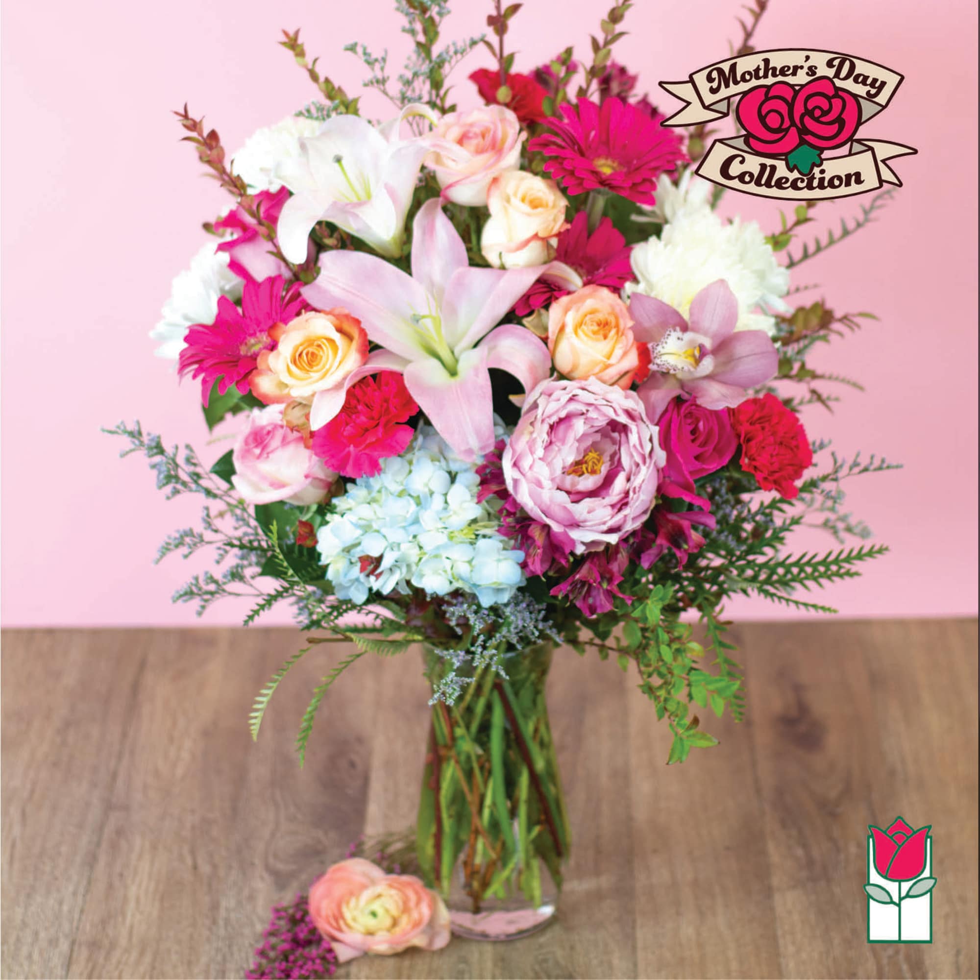 Mixed pink and white flower bouquet in a clear glass vase