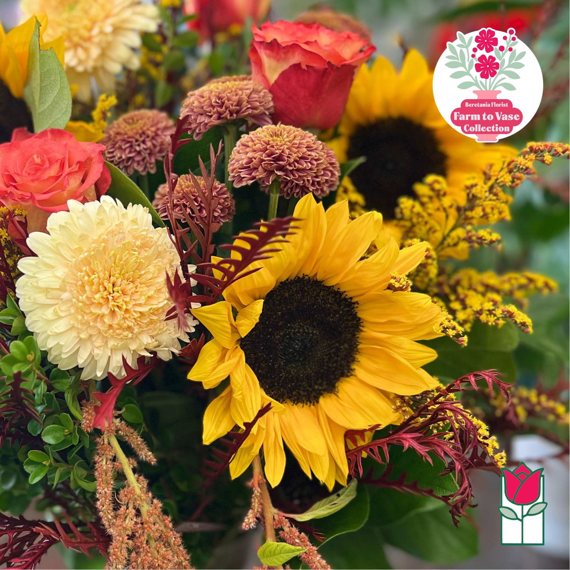Bouquet with sunflowers, roses, and chrysanthemums in bright mixed colors