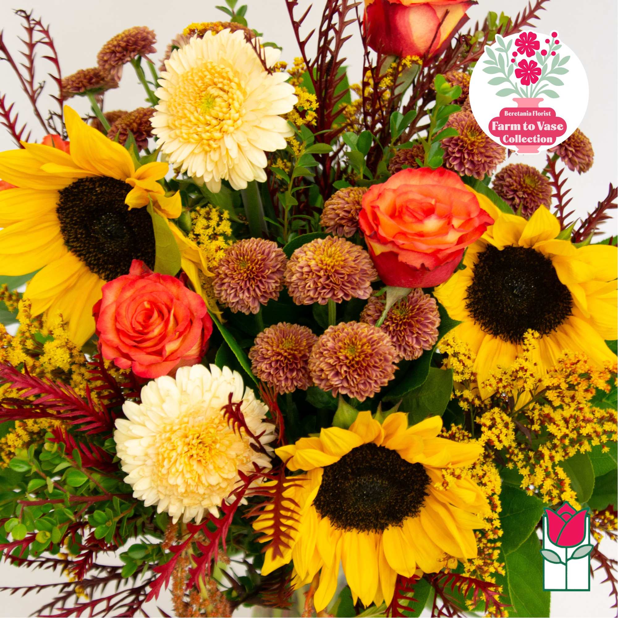 Mixed bouquet with sunflowers, roses, and chrysanthemums