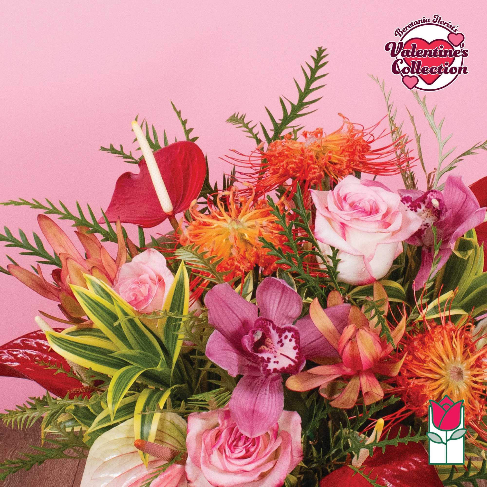 Tropical arrangement with pink roses, orchids, red anthurium, and orange protea against a pink background