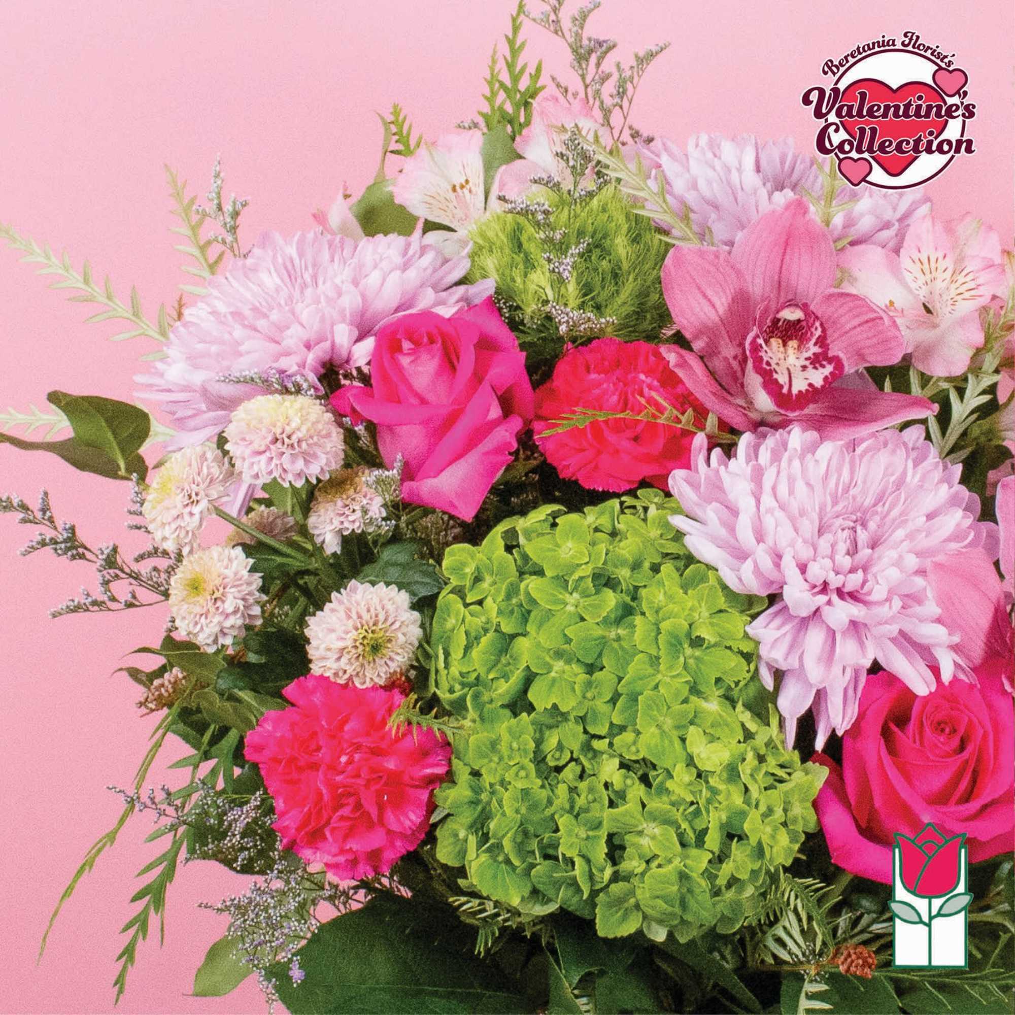 Pink bouquet with roses, orchids, chrysanthemums, and green hydrangea
