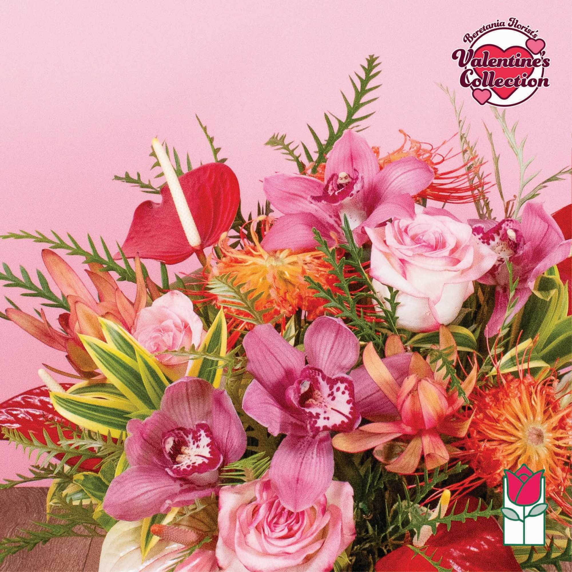 Vibrant arrangement of pink roses, orchids, red anthurium and orange protea on a pink background