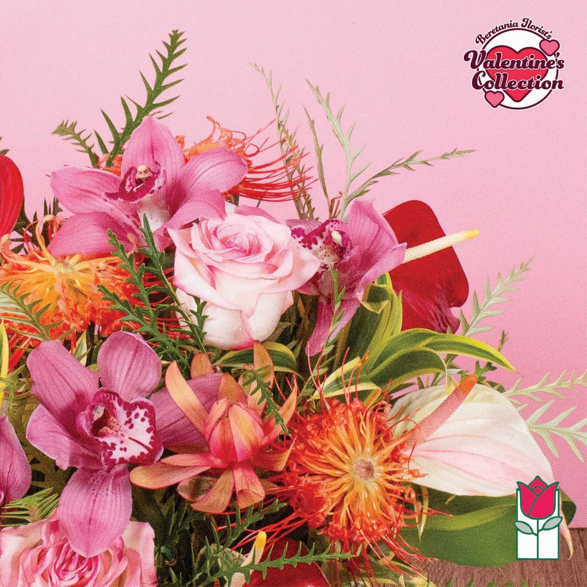 Vibrant bouquet of pink orchids, roses, and orange tropical blooms against a pink background