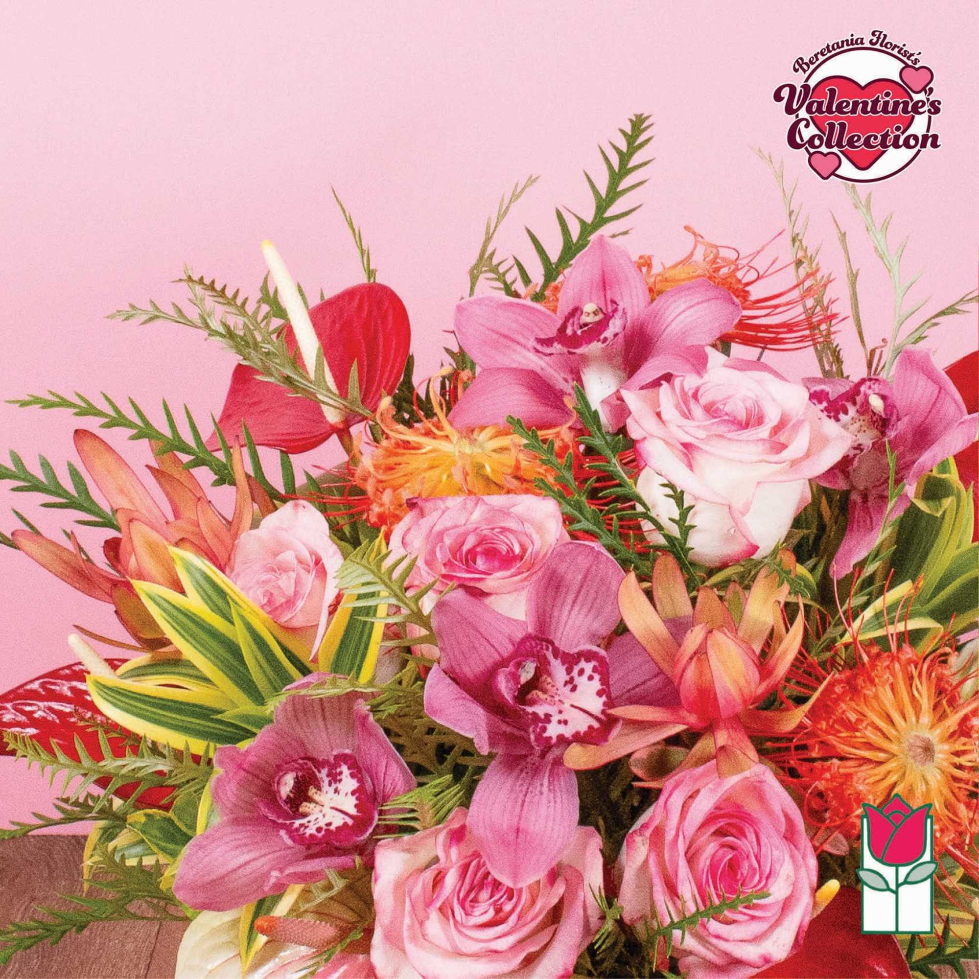 Vibrant bouquet of pink roses, orchids, and orange tropical blooms against a pink background