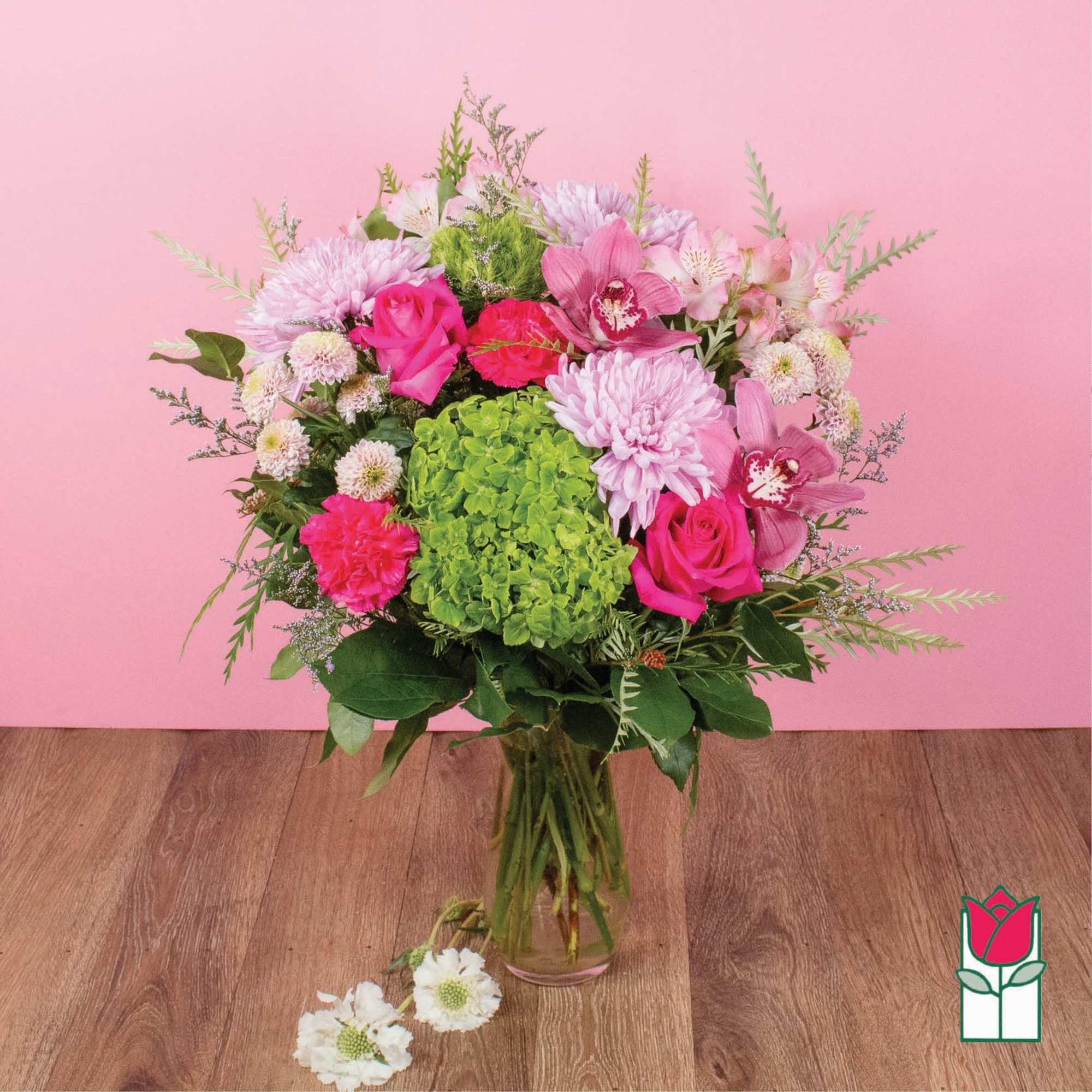 Pink and white mixed bouquet in a glass vase