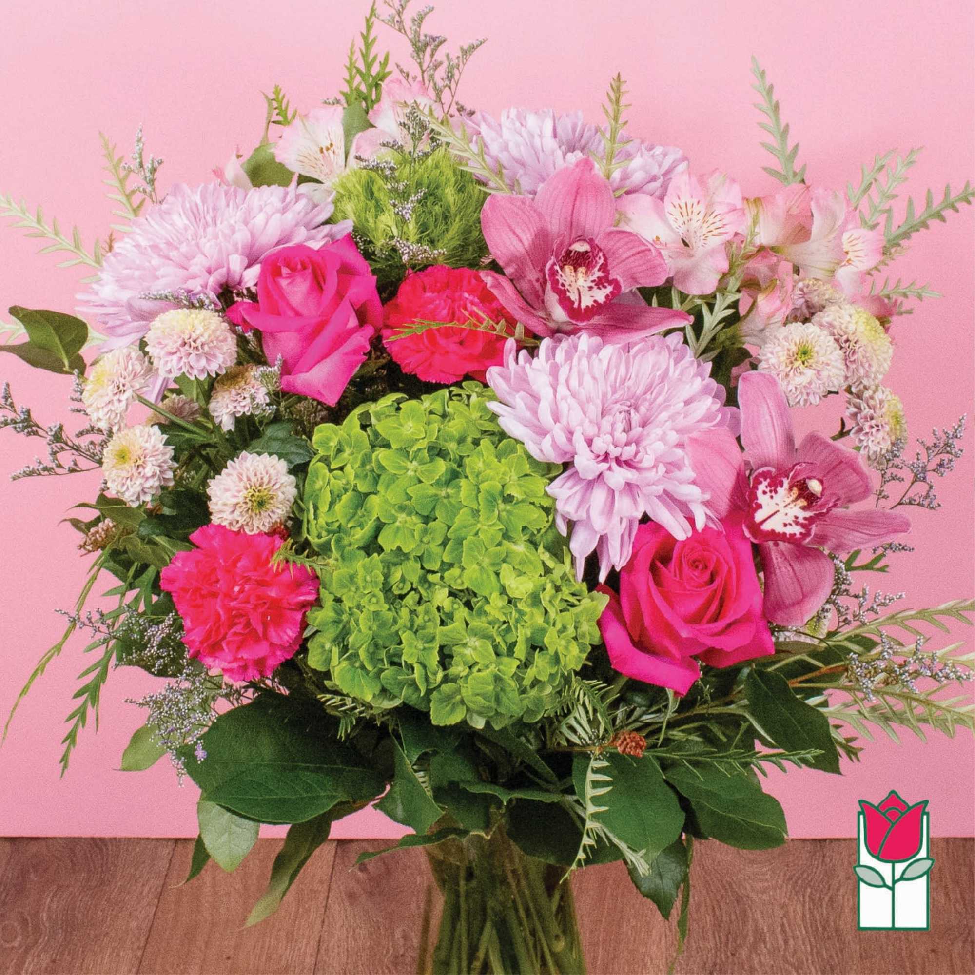 Pink and green mixed bouquet with roses, orchids, chrysanthemums, and hydrangea