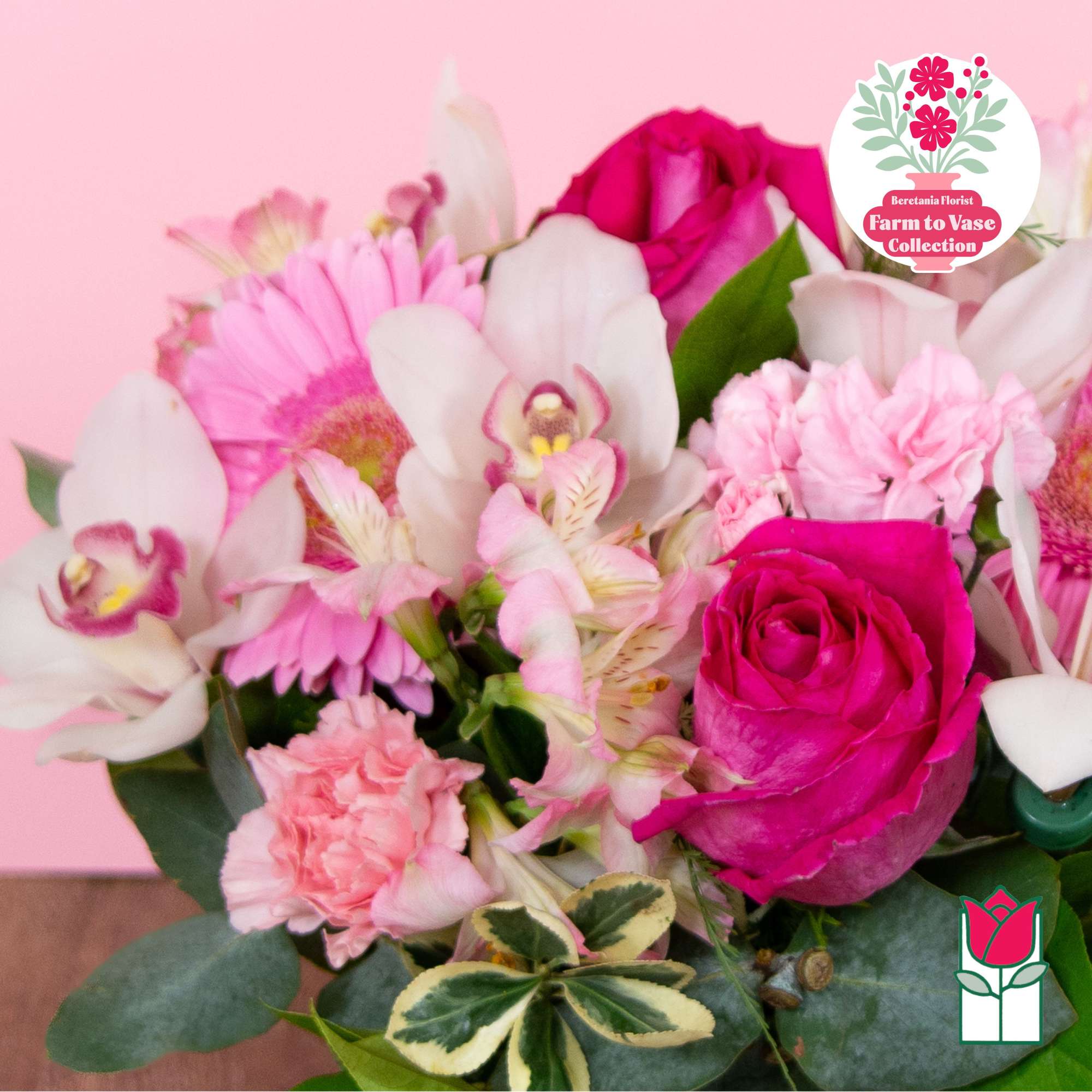 Pink and white bouquet with roses, orchids, and daisies