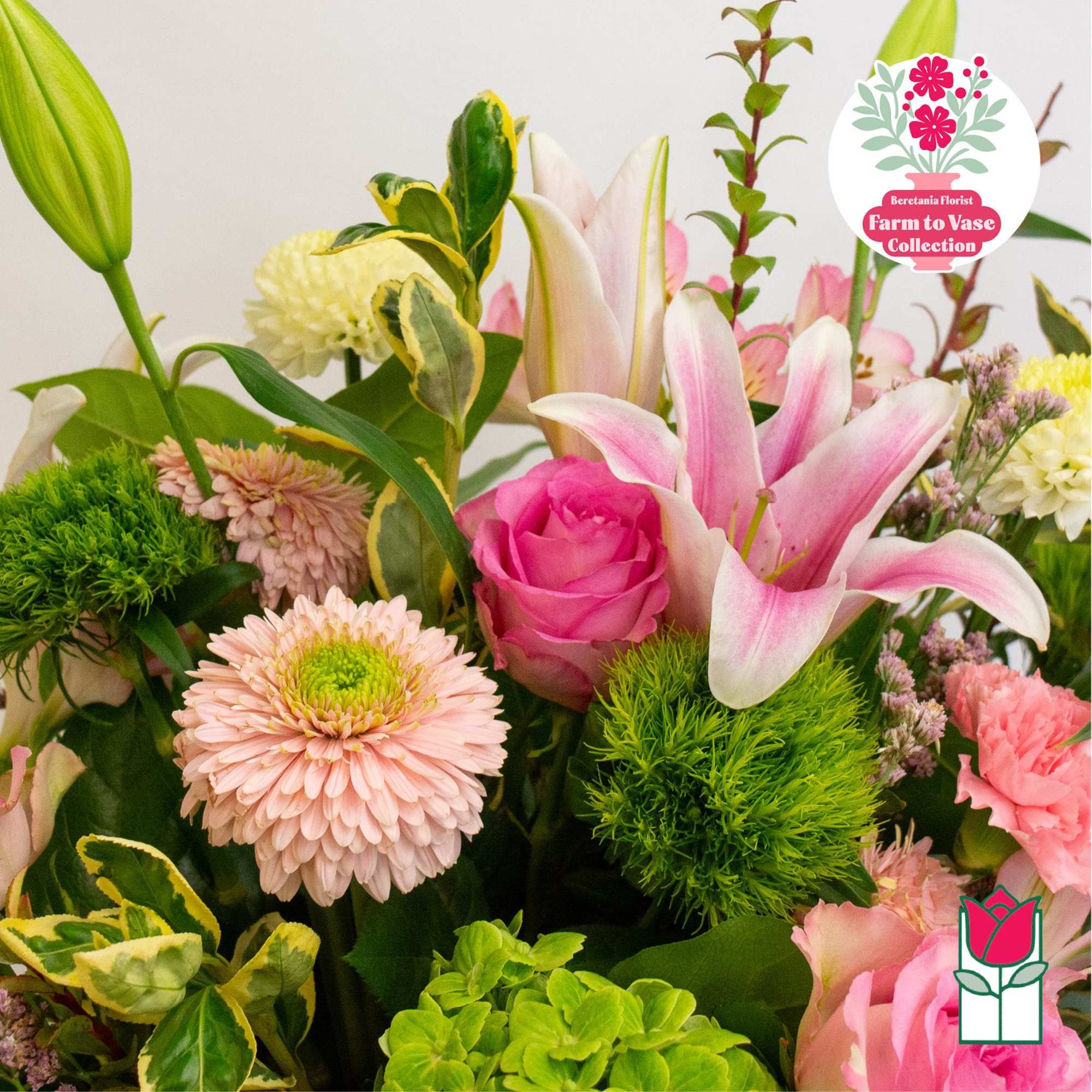 Mixed bouquet with pink lilies, roses, and chrysanthemums