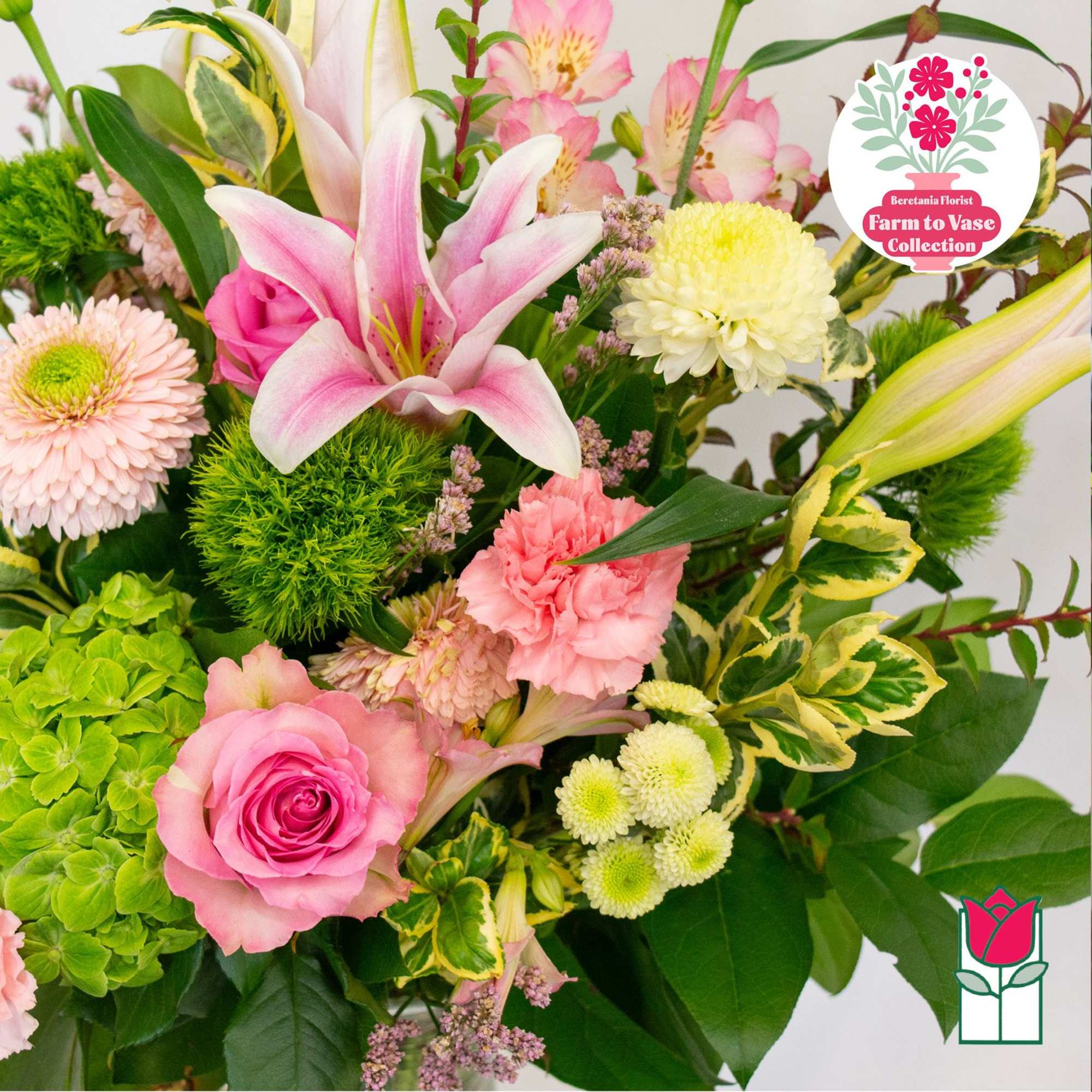 Mixed bouquet with pink lilies, roses, carnations, and chrysanthemums