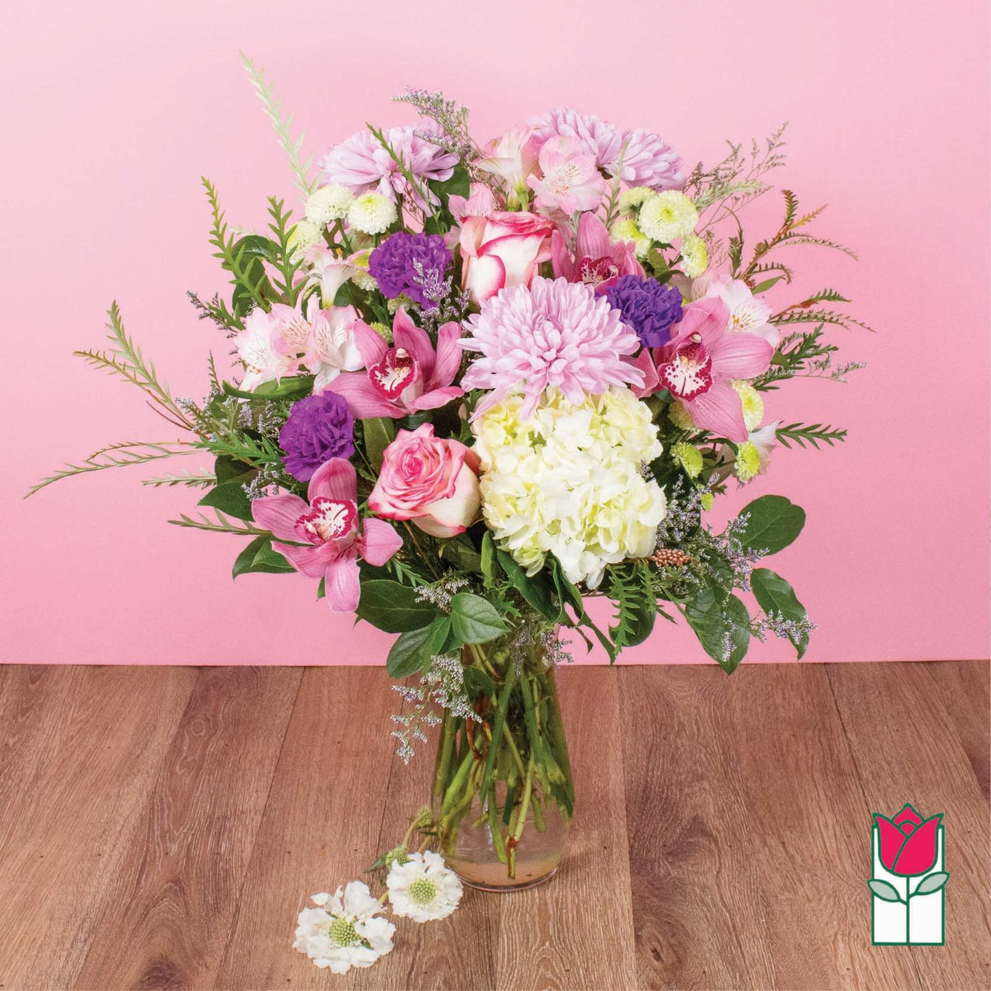 Pink and white mixed bouquet in a clear glass vase