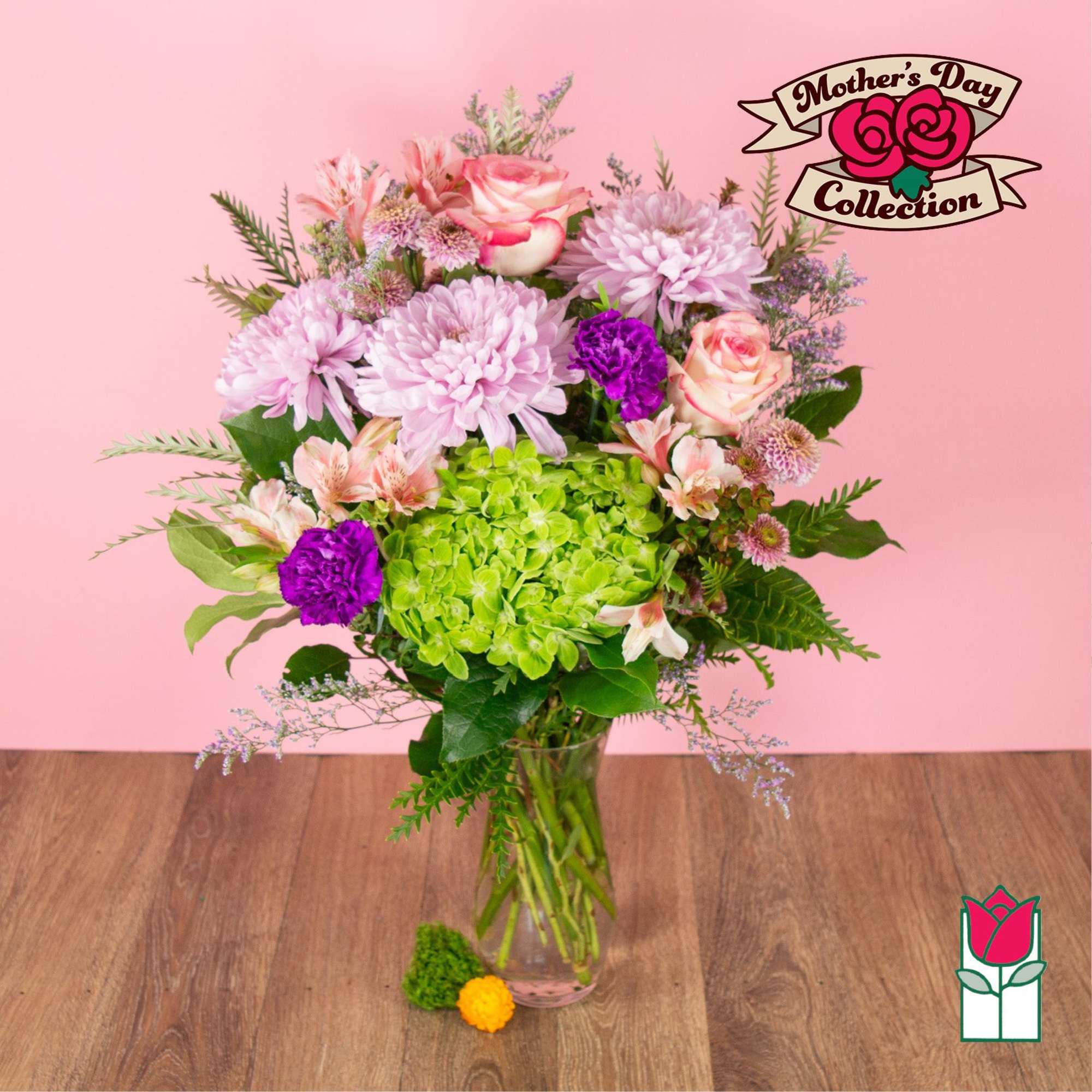 Pink and purple mixed bouquet in a clear glass vase