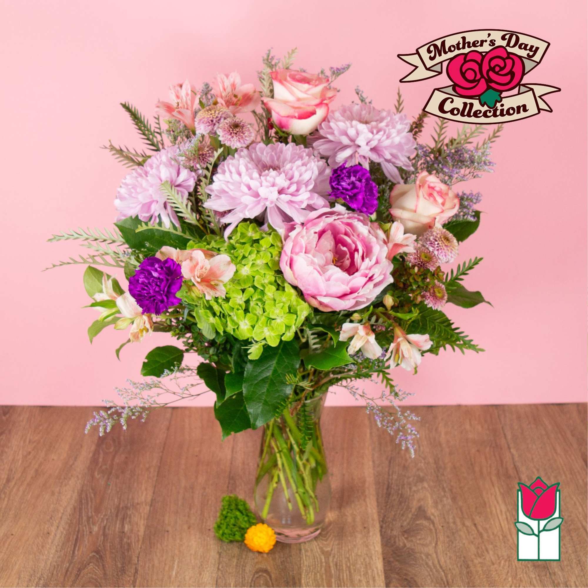 Pink and purple mixed bouquet in a clear glass vase, photo 5 of 8