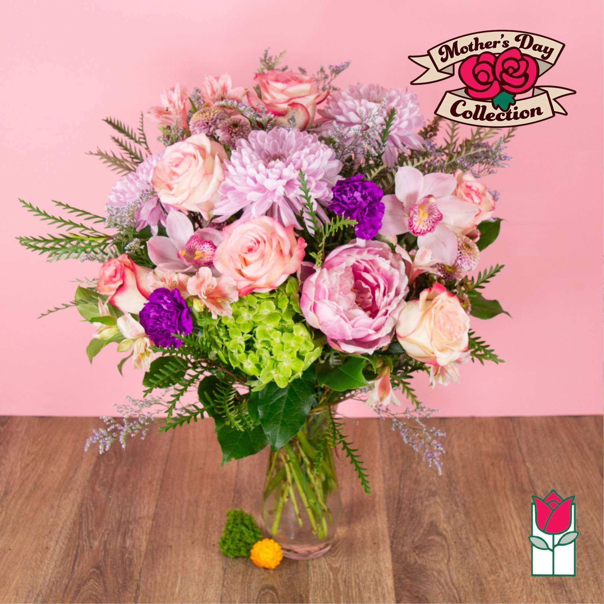Pink and purple mixed bouquet in a clear glass vase, photo 5 of 8