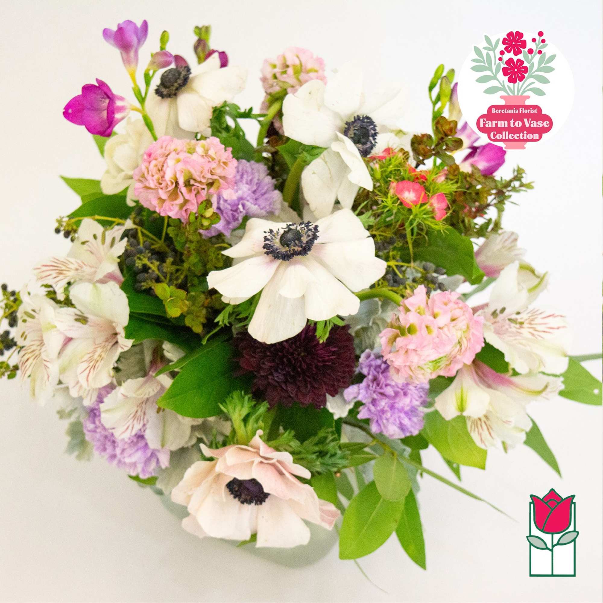 Mixed bouquet with white, pink, and purple flowers