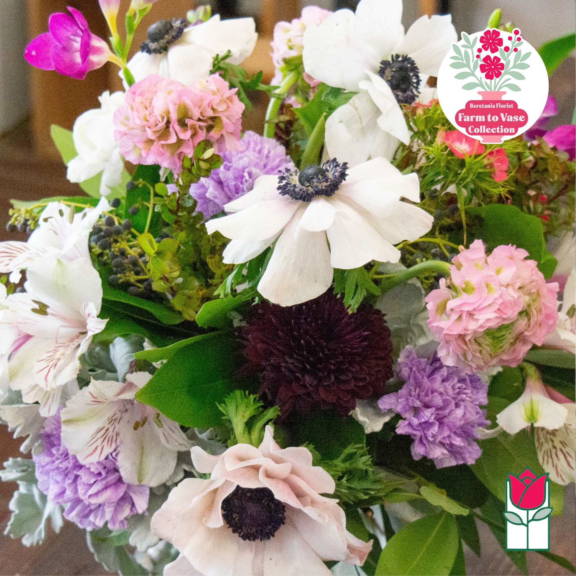 Mixed bouquet of white, pink, and purple flowers