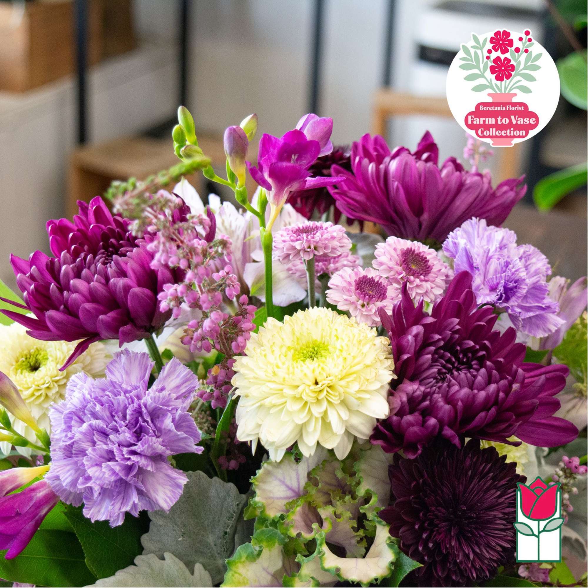 Mixed bouquet of purple, pink, and white flowers