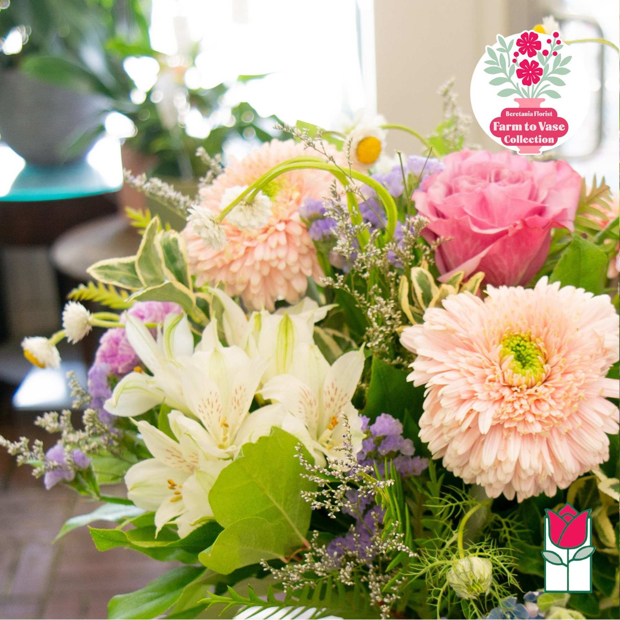 Mixed bouquet with pink, white, and purple flowers