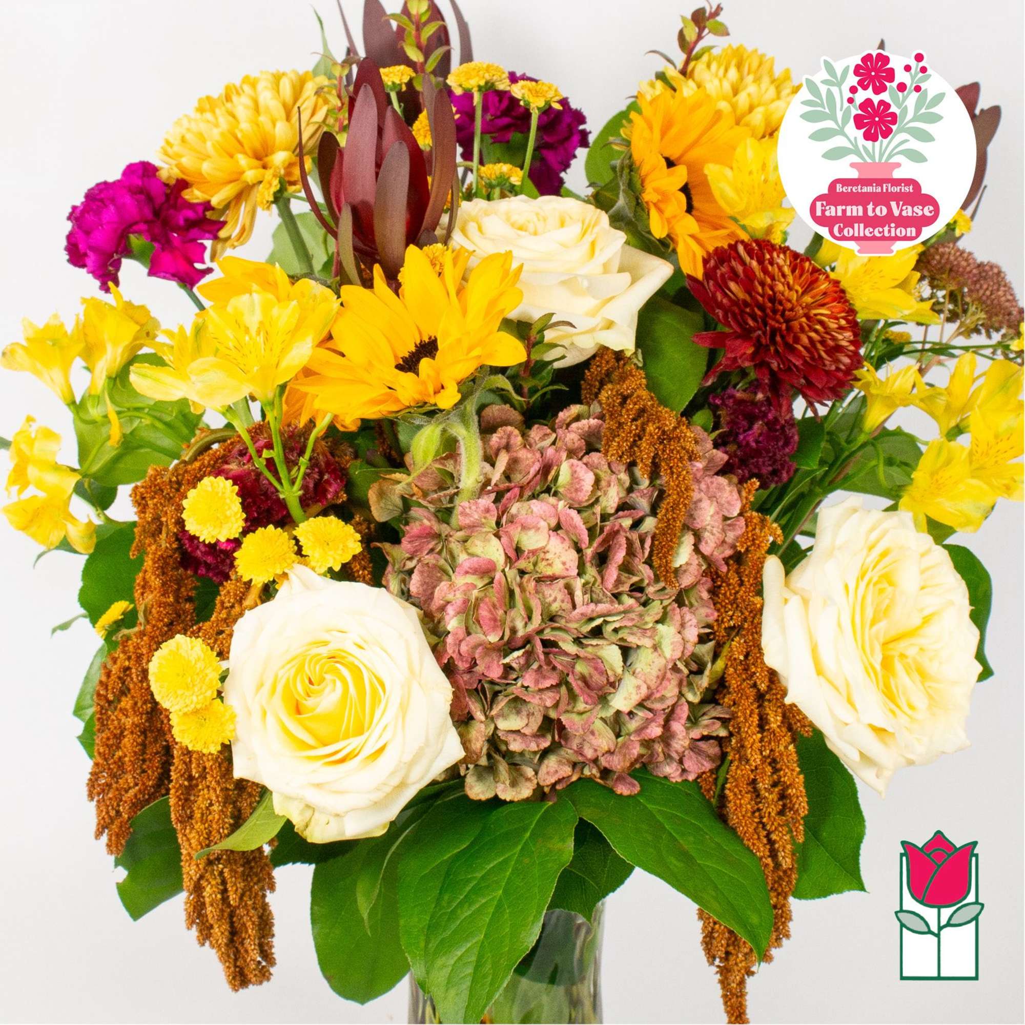 Mixed bouquet with yellow and white flowers in a glass vase