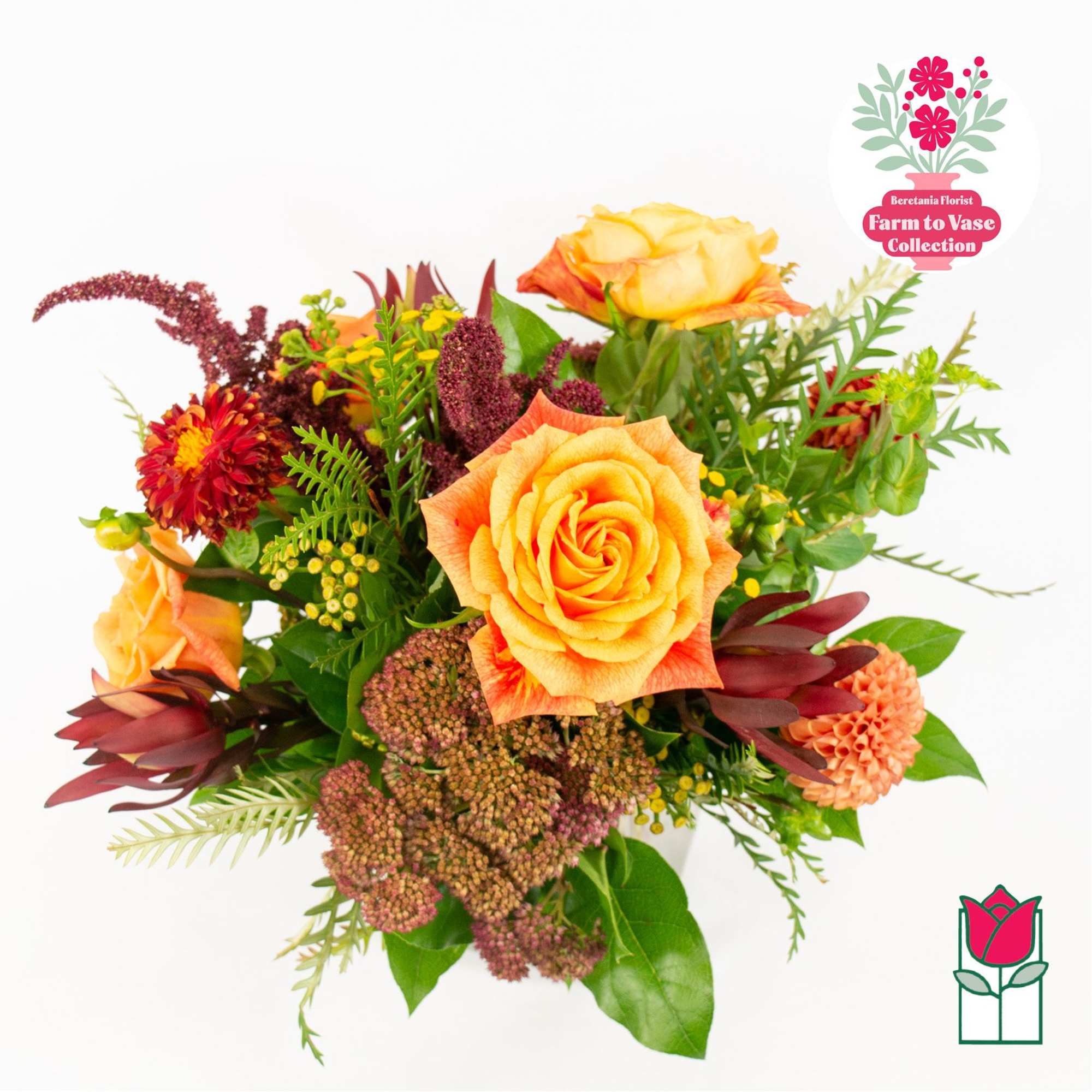 Bouquet of orange roses and mixed autumn flowers