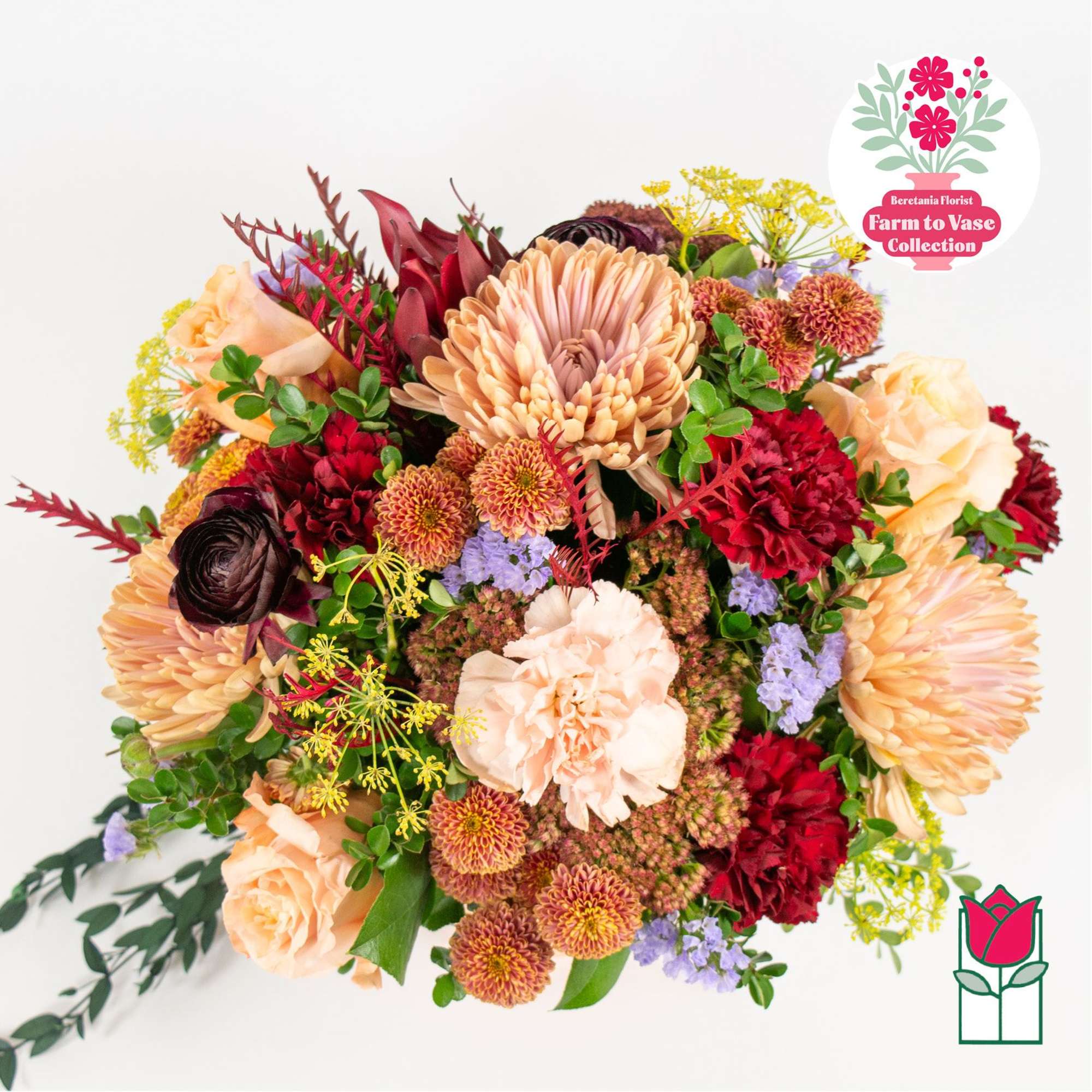 Mixed bouquet with peach, red, and purple flowers